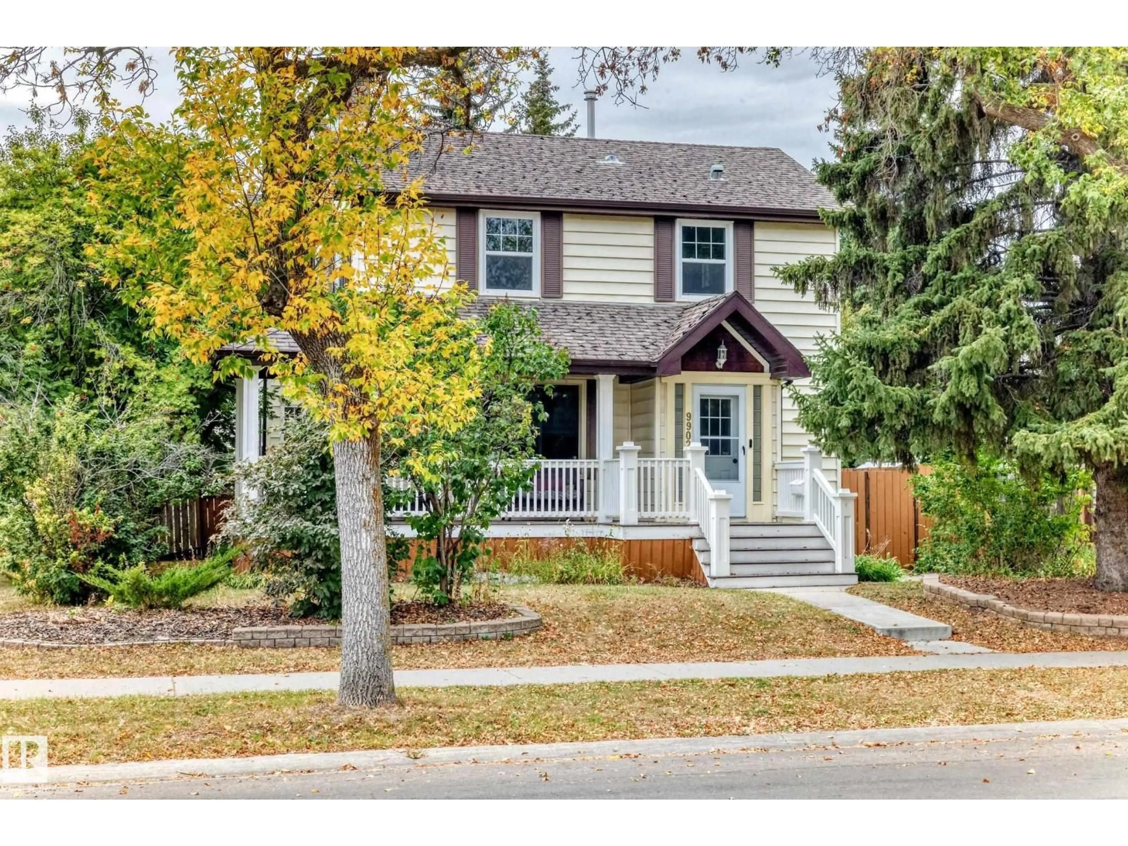 Home with vinyl exterior material, street for 9902 148 ST, Edmonton Alberta T5N3E9
