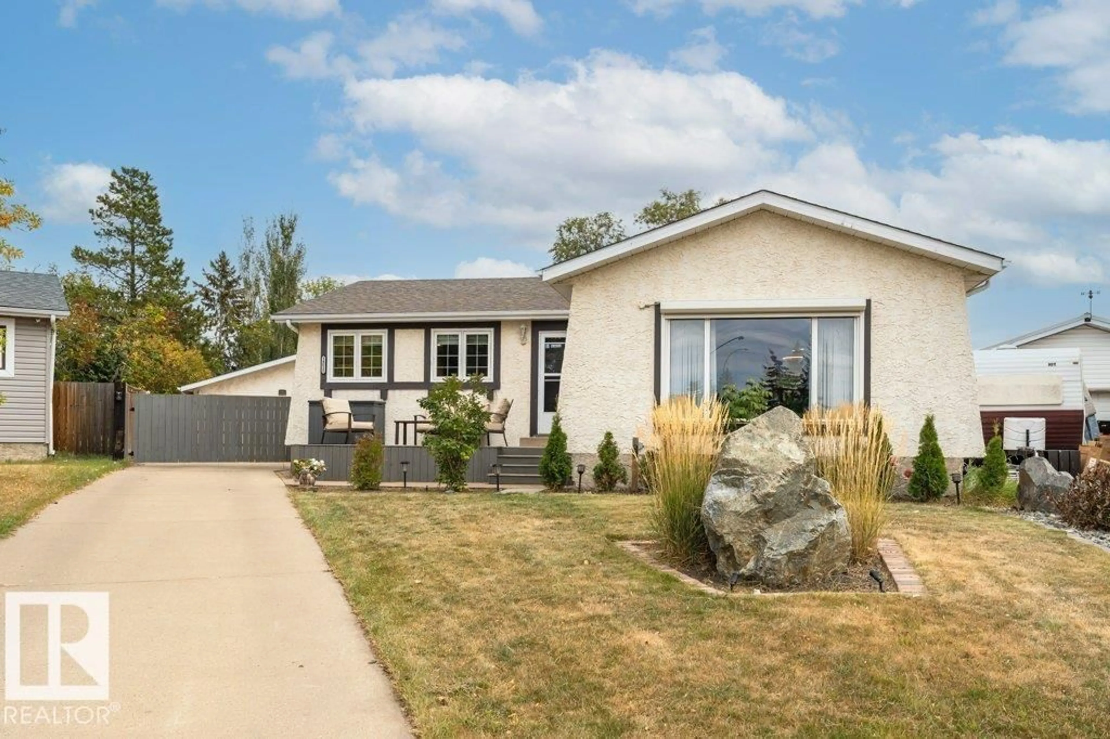 Home with vinyl exterior material, street for NW - 14015 23 ST, Edmonton Alberta T5Y1C3
