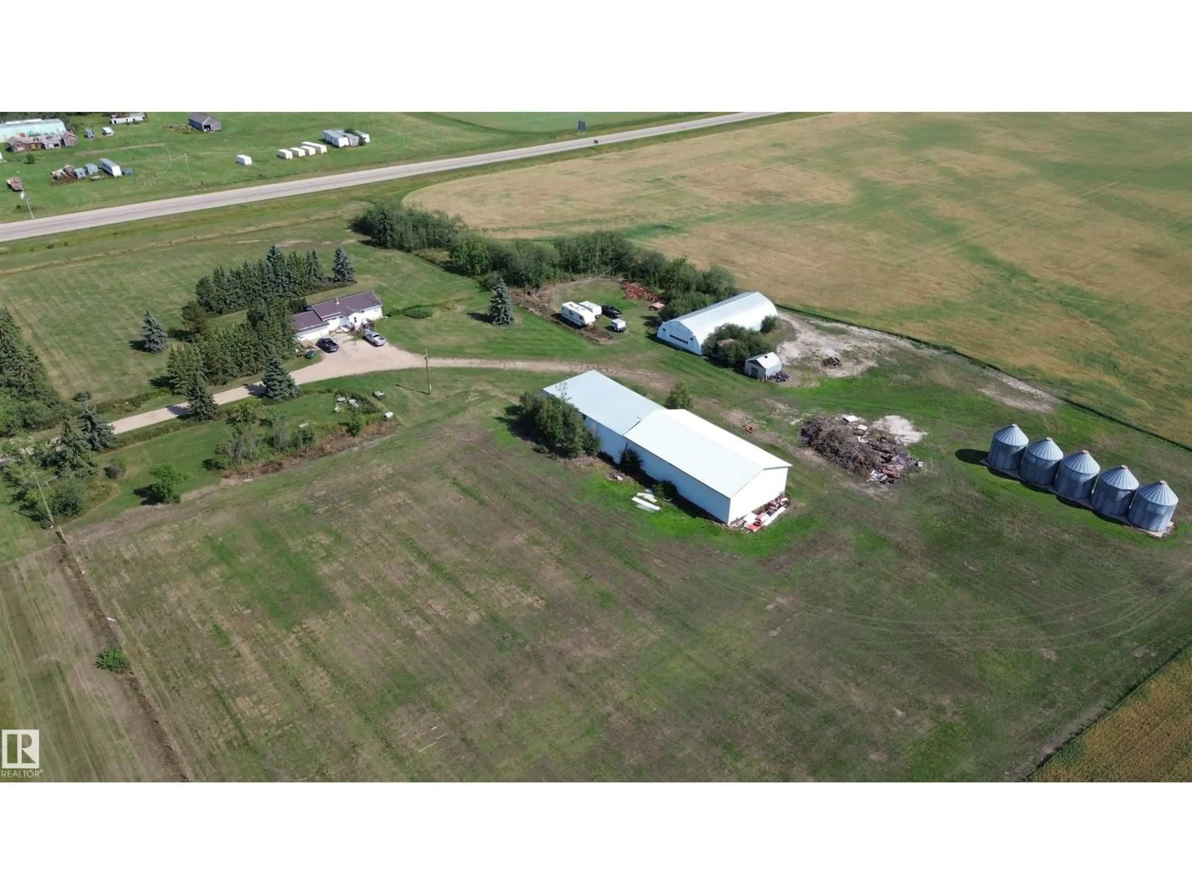 A pic from outside/outdoor area/front of a property/back of a property/a pic from drone, building for 9839 115 AV, Rural Westlock County Alberta T7P1P5