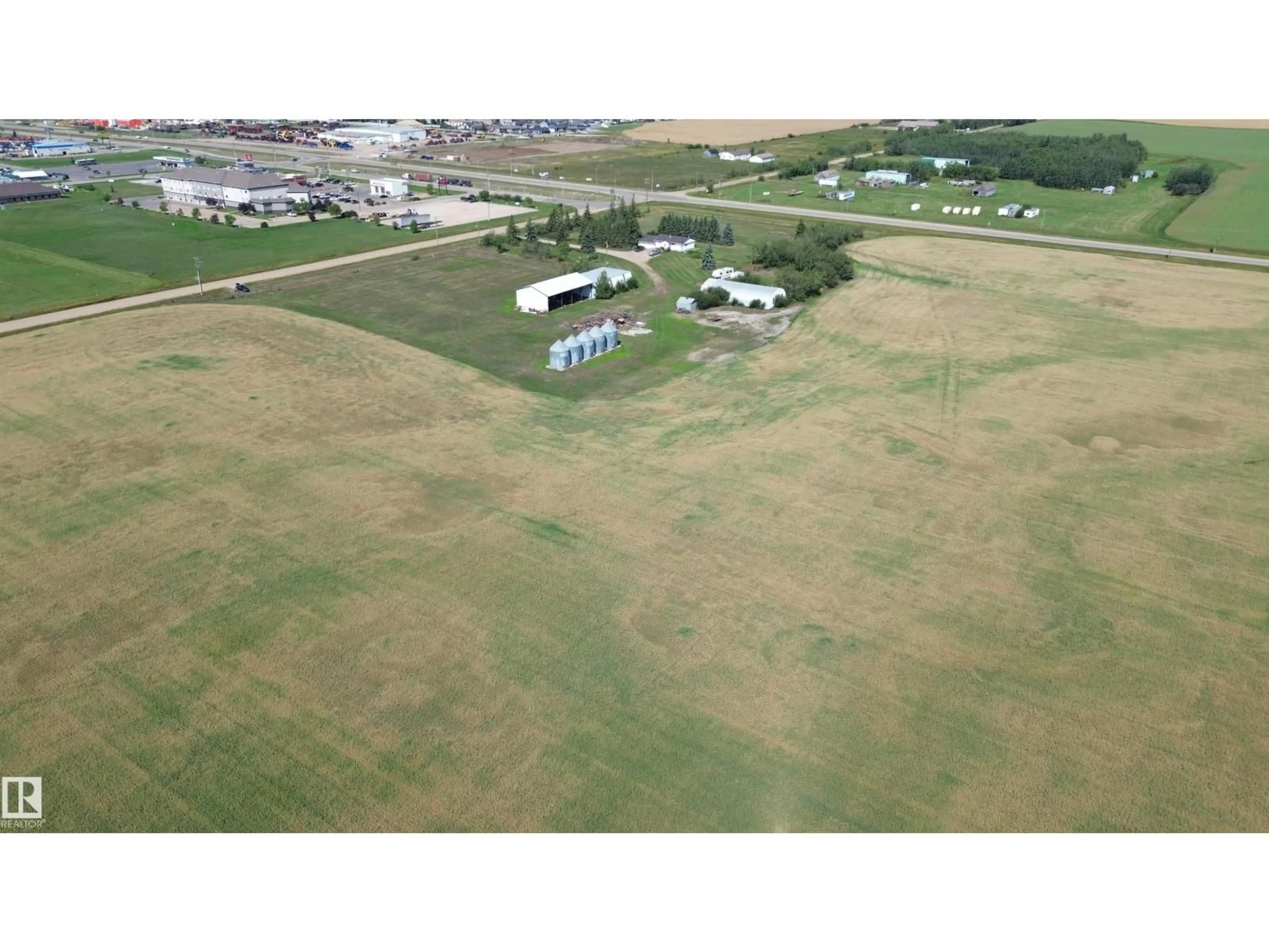 A pic from outside/outdoor area/front of a property/back of a property/a pic from drone, building for 9839 115 AV, Rural Westlock County Alberta T7P1P5