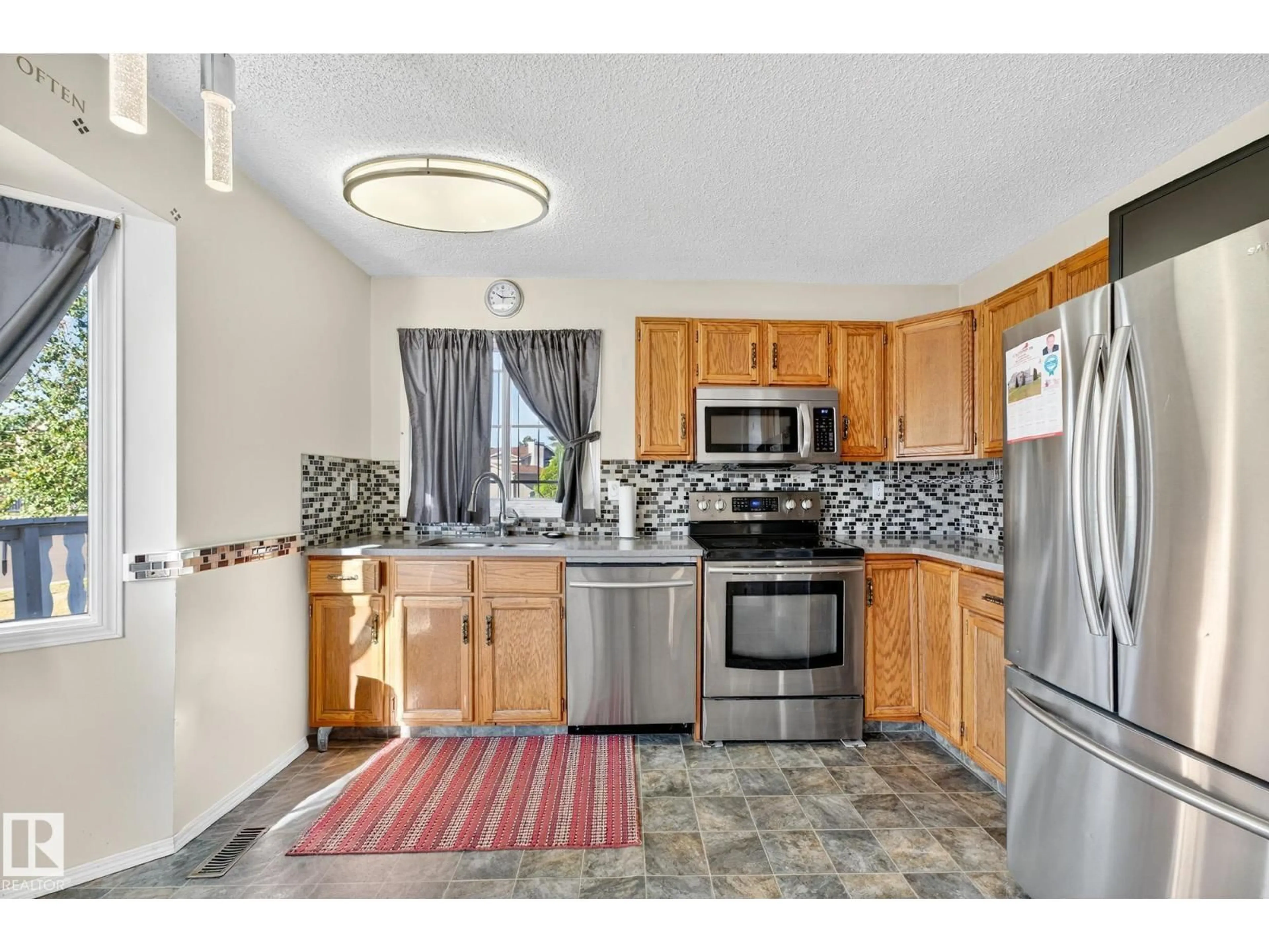 Standard kitchen, ceramic/tile floor for NW - 14511 37 ST, Edmonton Alberta T5Y2K8