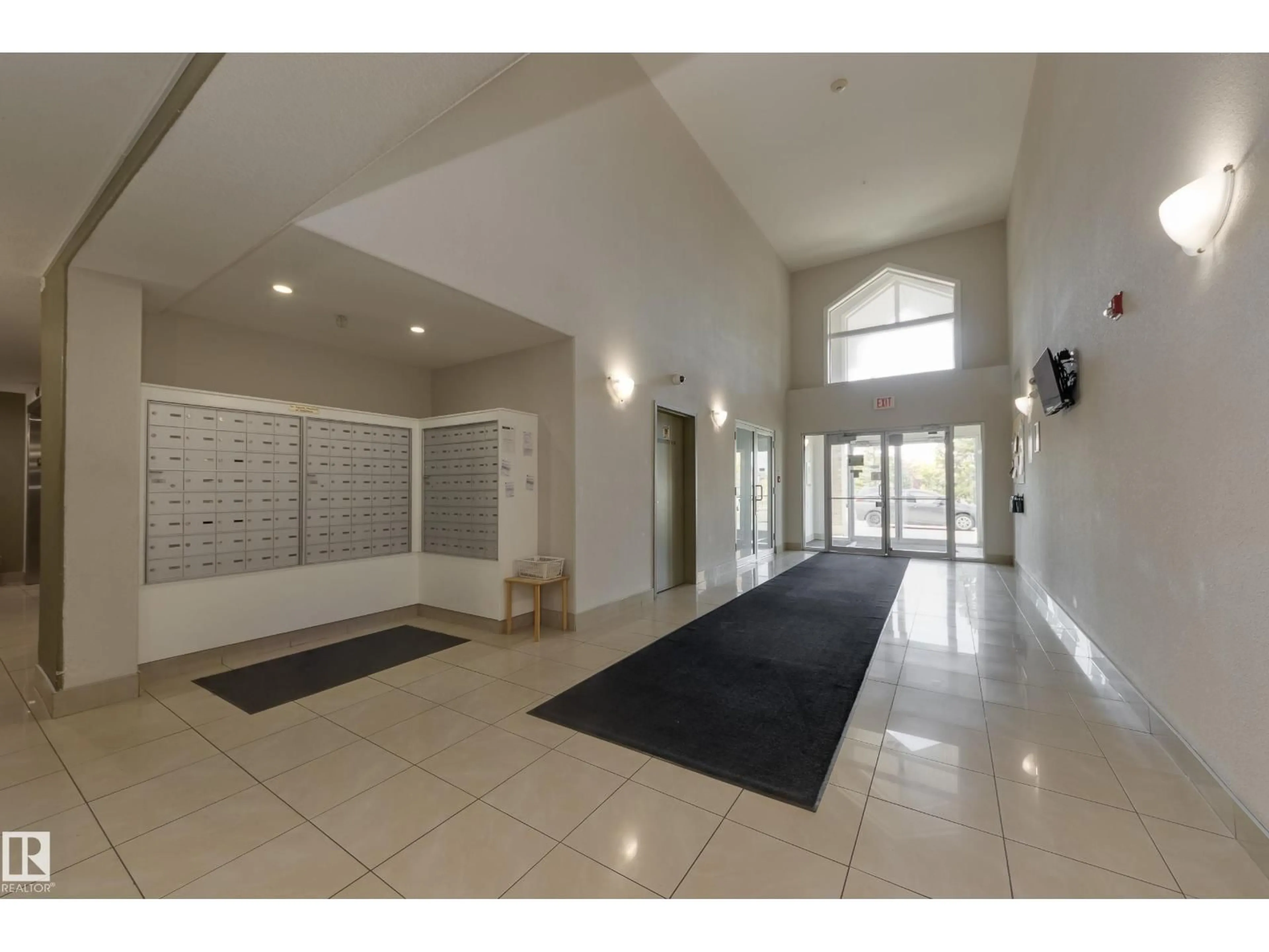 Indoor foyer for 216 - 240 SPRUCE RIDGE RD, Spruce Grove Alberta T7X2J7