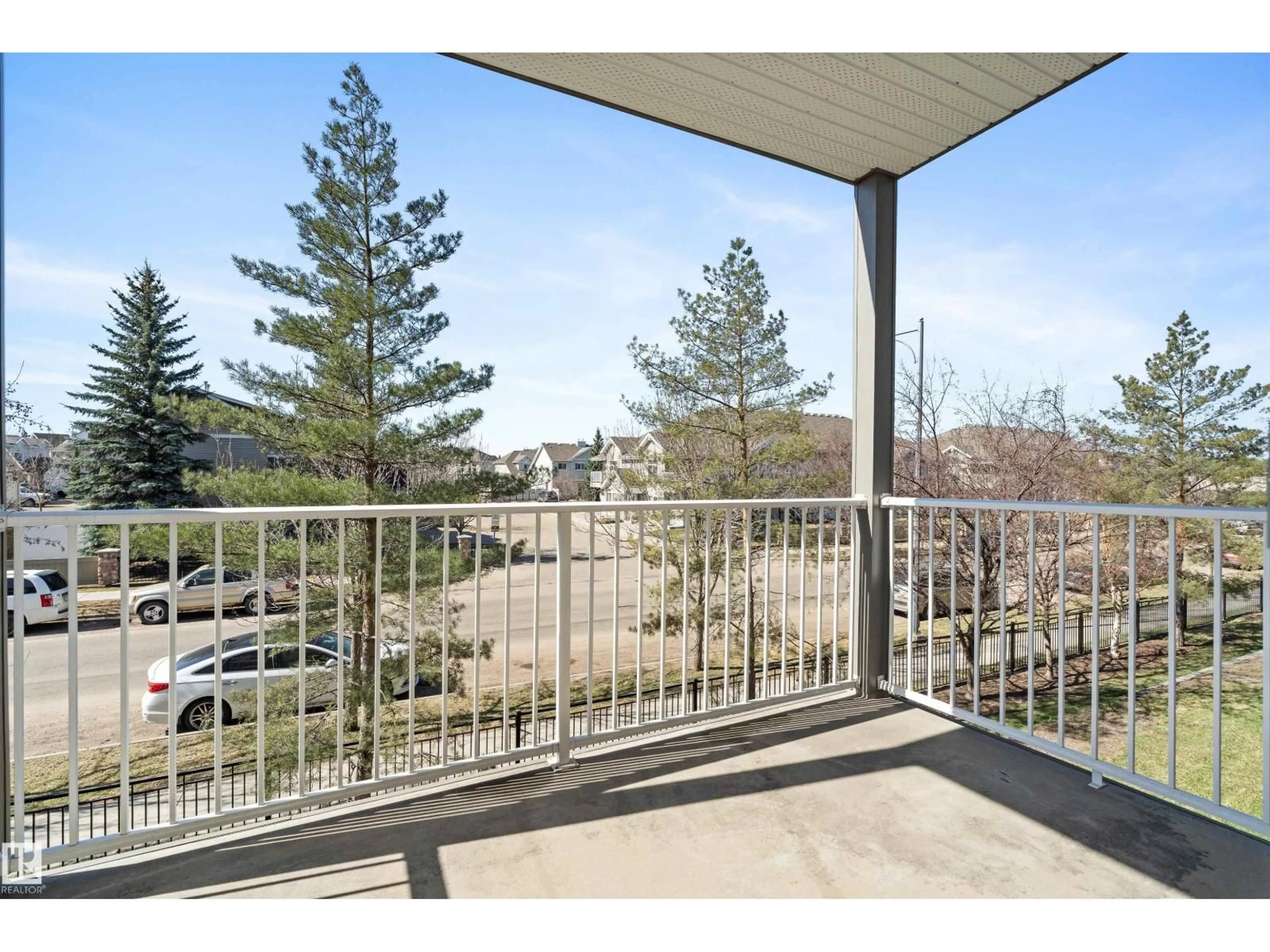 Patio, water/lake/river/ocean view for #209 - 155 EDWARDS DR, Edmonton Alberta T6X1N6