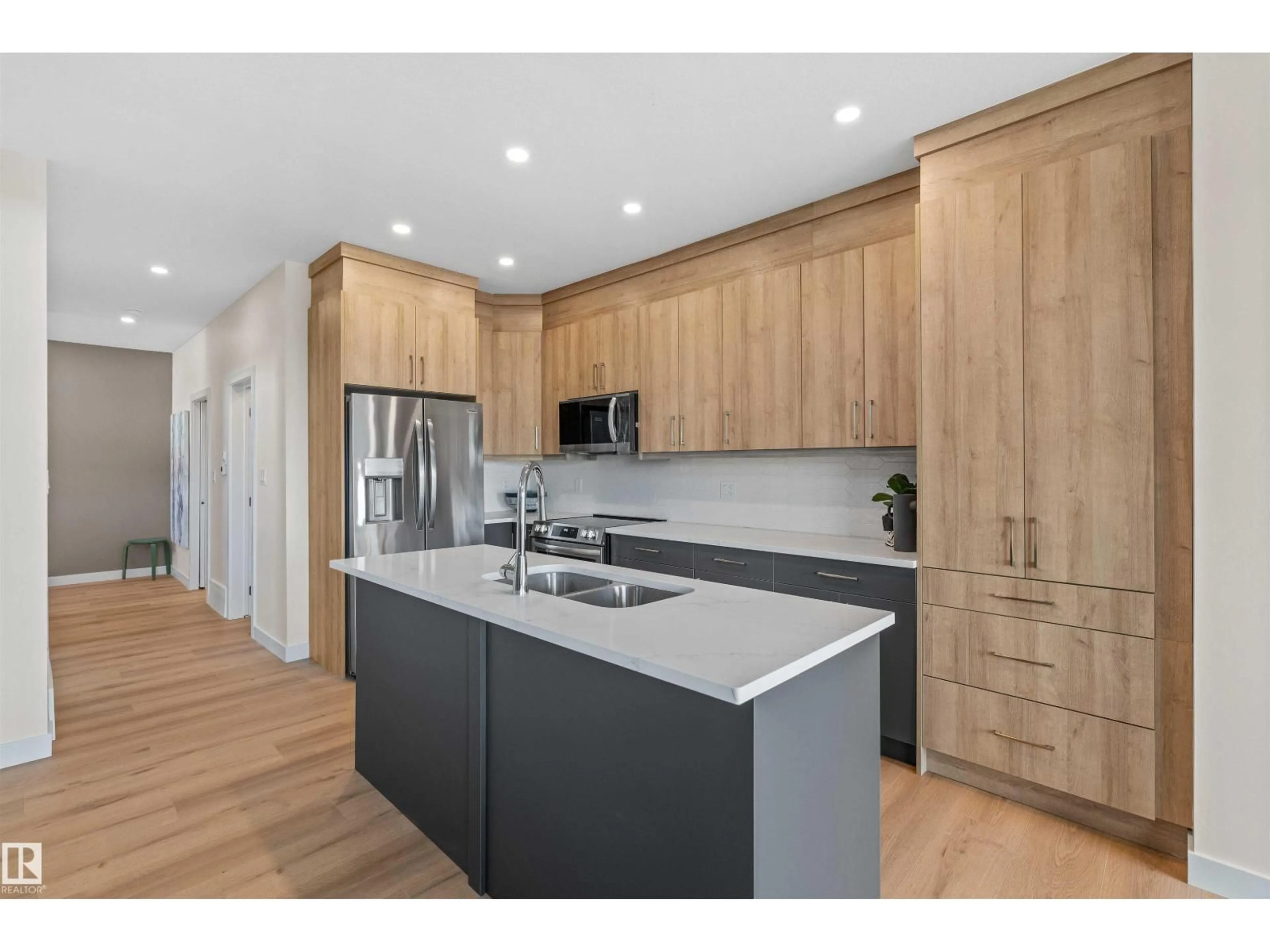 Open concept kitchen, wood/laminate floor for NW - 1904 155 AV, Edmonton Alberta T5Y4H8