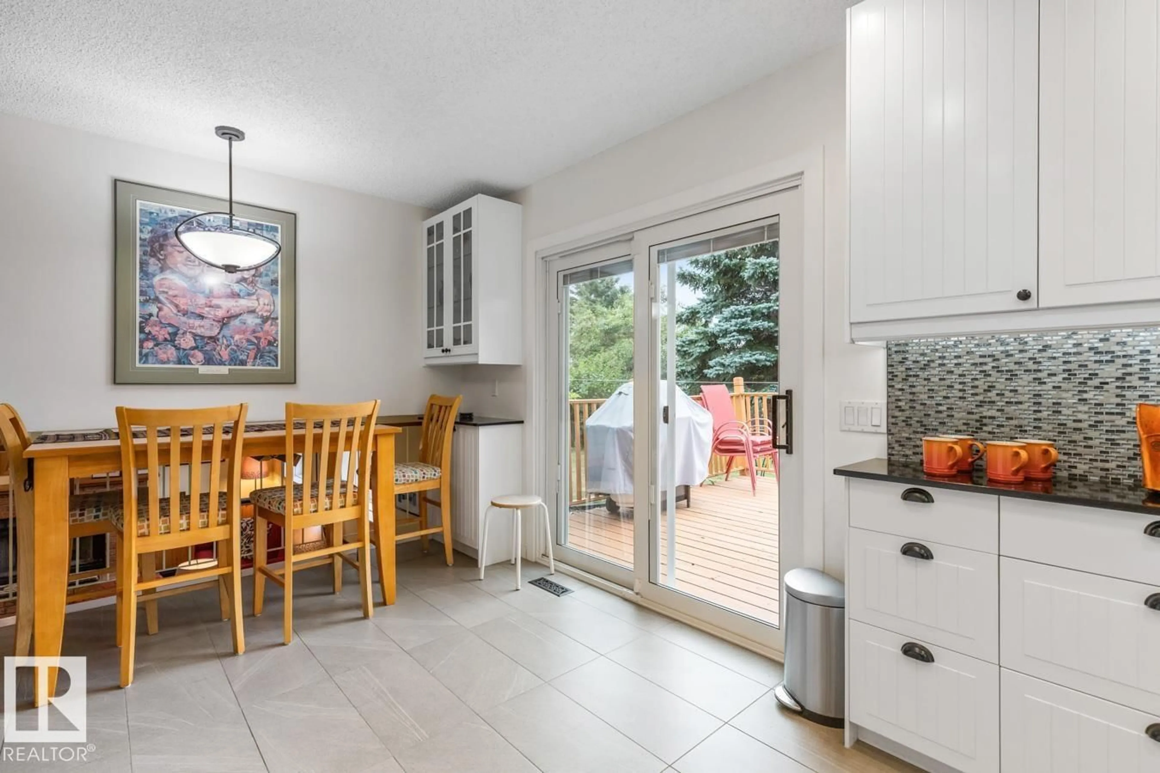 Open concept kitchen, ceramic/tile floor for 4631 10 AV NW, Edmonton Alberta T6L4S2