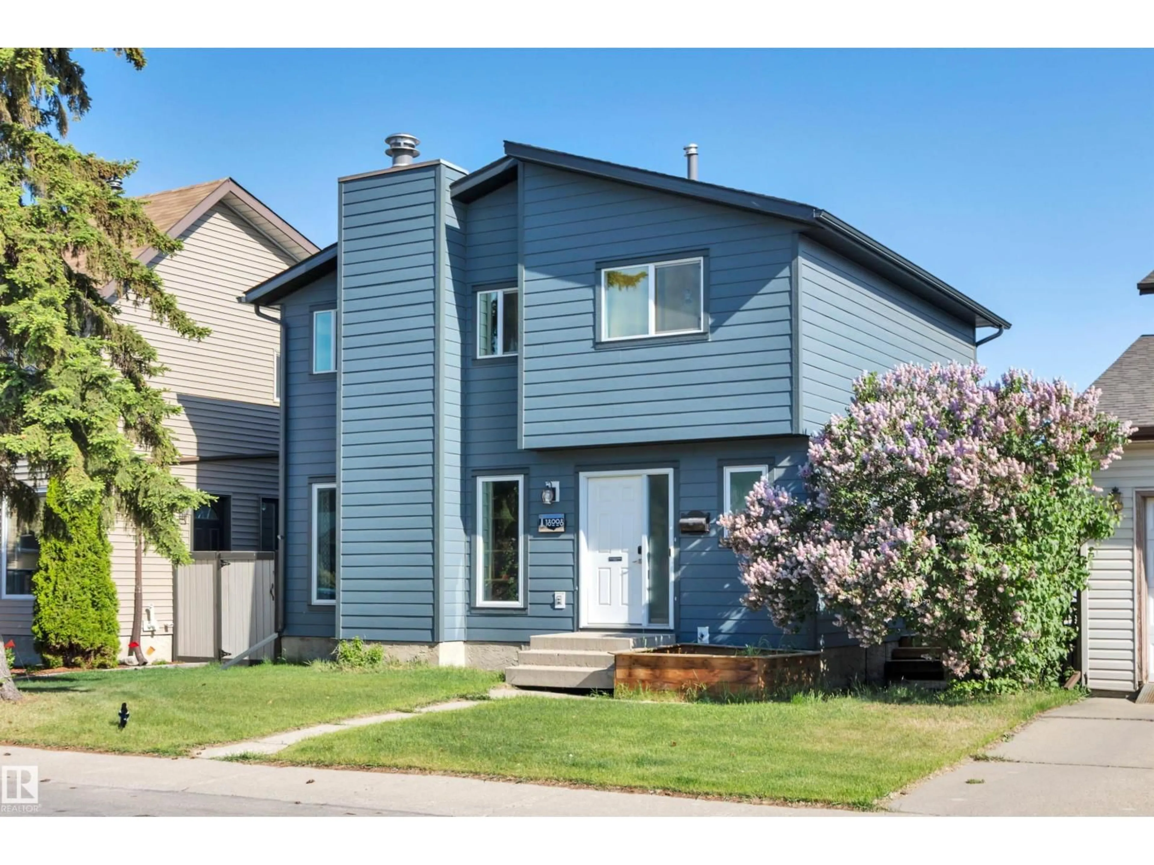 Home with vinyl exterior material, street for 18008 75 AV, Edmonton Alberta T5T2H2