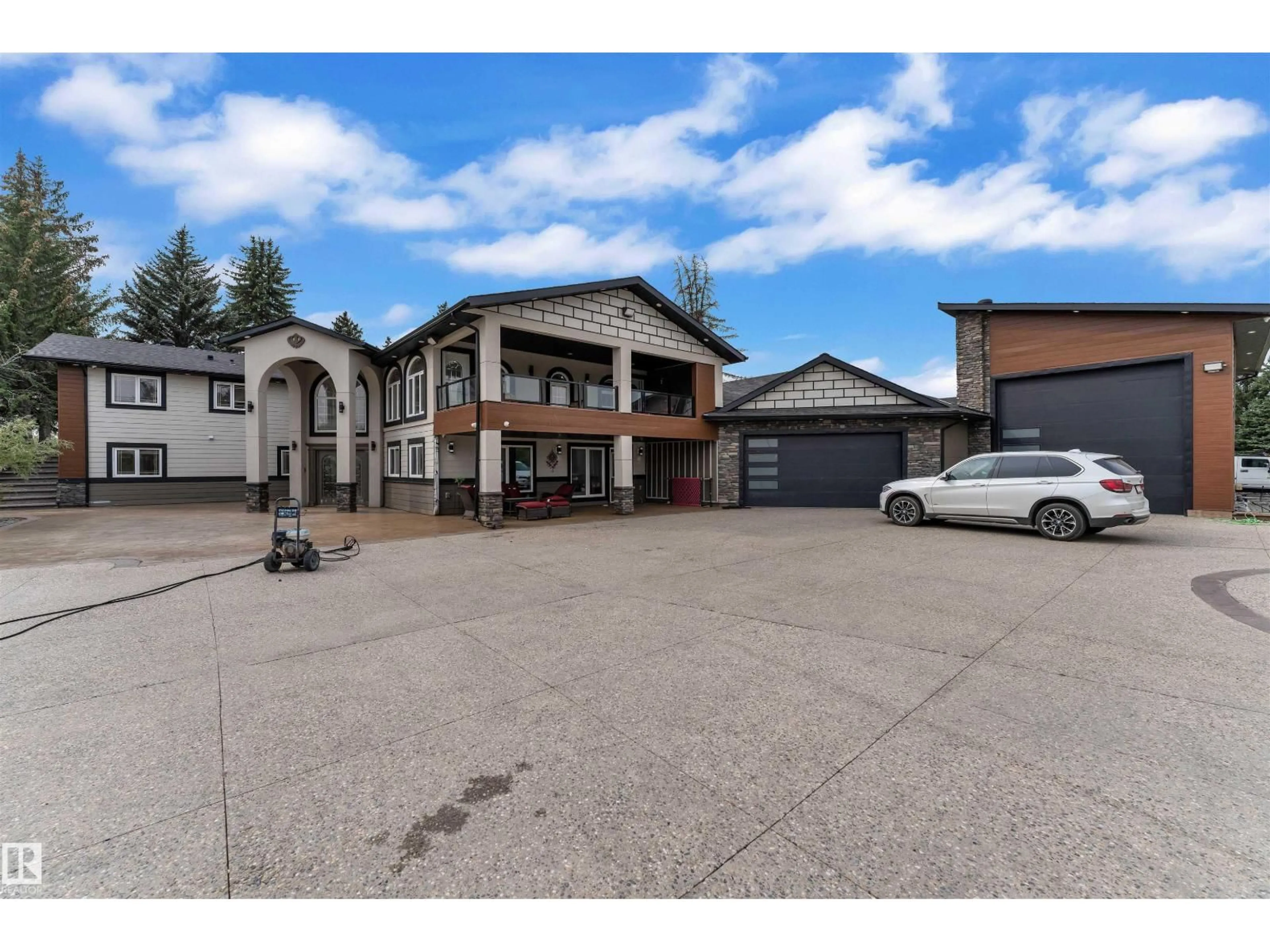 A pic from outside/outdoor area/front of a property/back of a property/a pic from drone, street for 23020 - 230 TWP 522, Rural Strathcona County Alberta T8B1H8