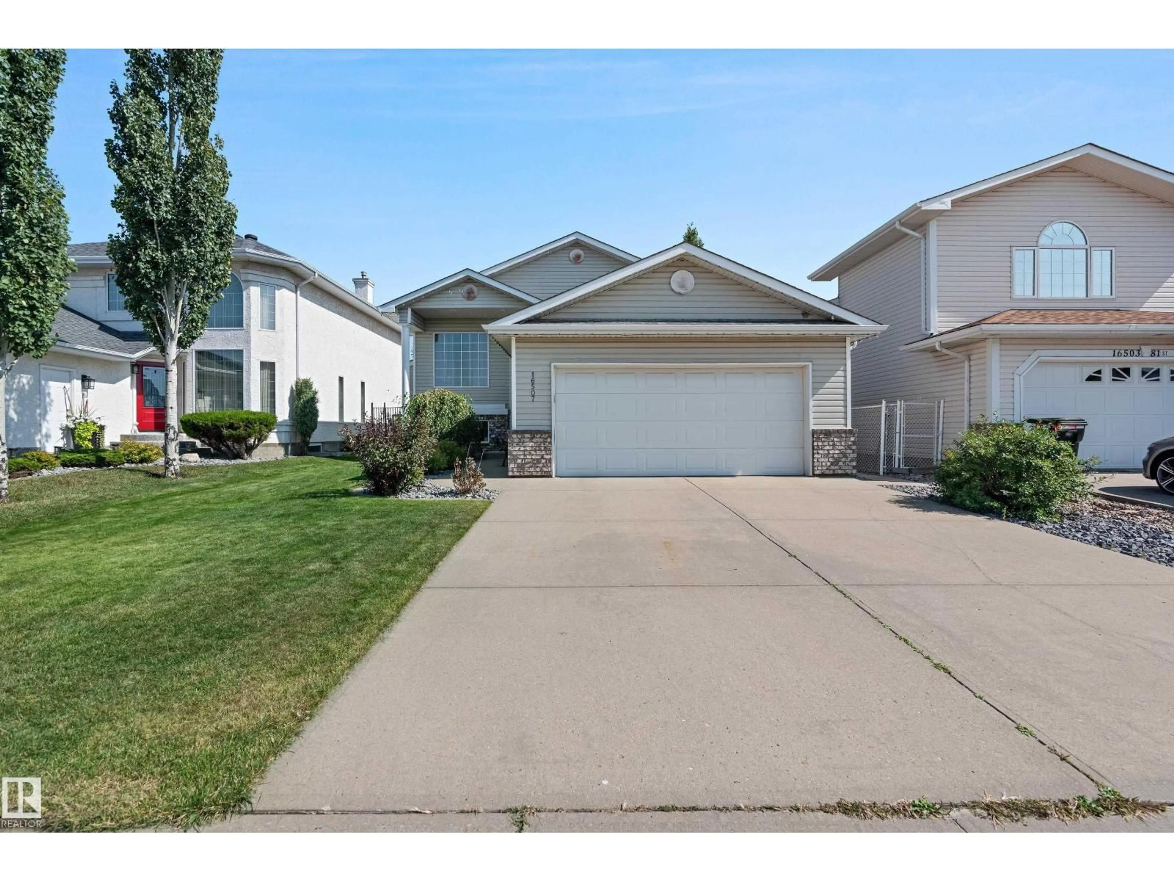 Home with vinyl exterior material, street for 16507 81 ST, Edmonton Alberta T5Z3J4