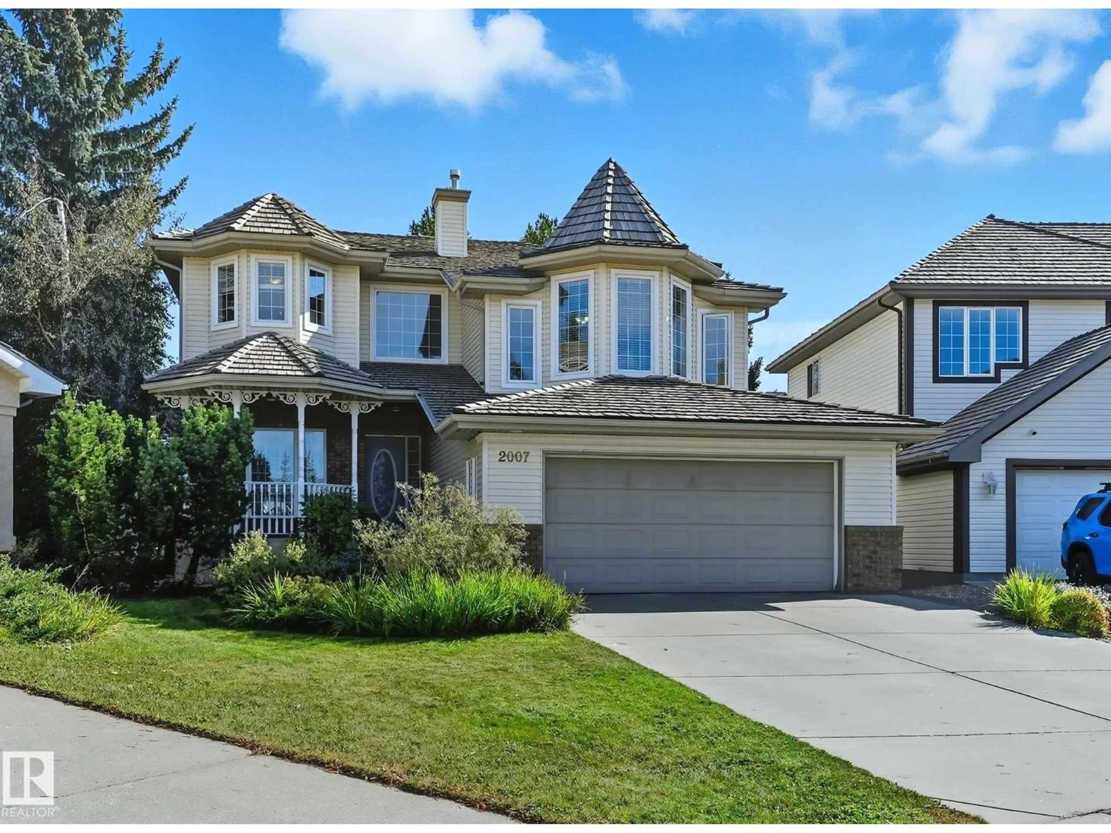 Home with vinyl exterior material, street for 2007 HADDOW DR, Edmonton Alberta T6R2P2