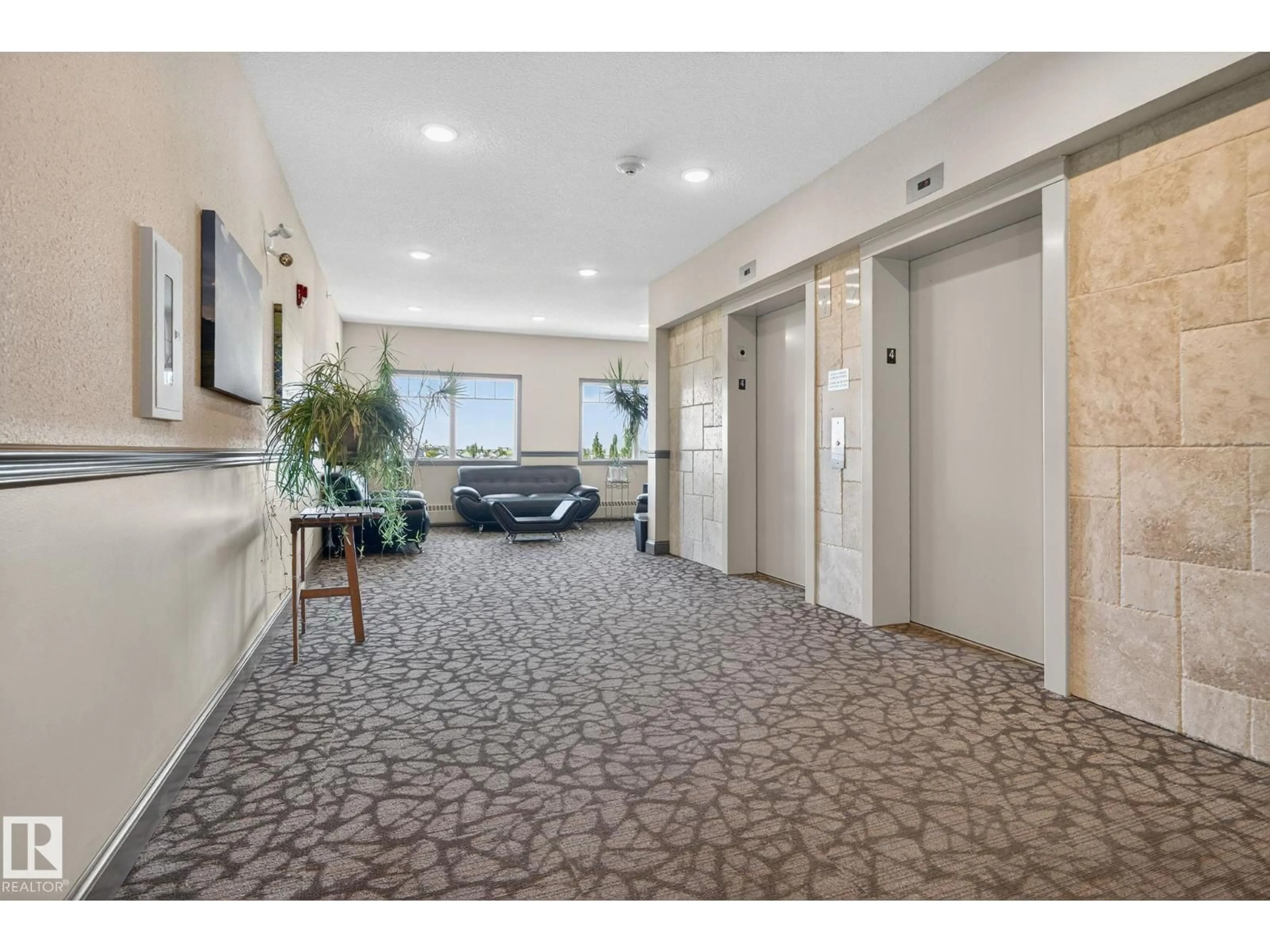 Indoor foyer for 417 - 7021 SOUTH TERWILLEGAR DR, Edmonton Alberta T6R0W5