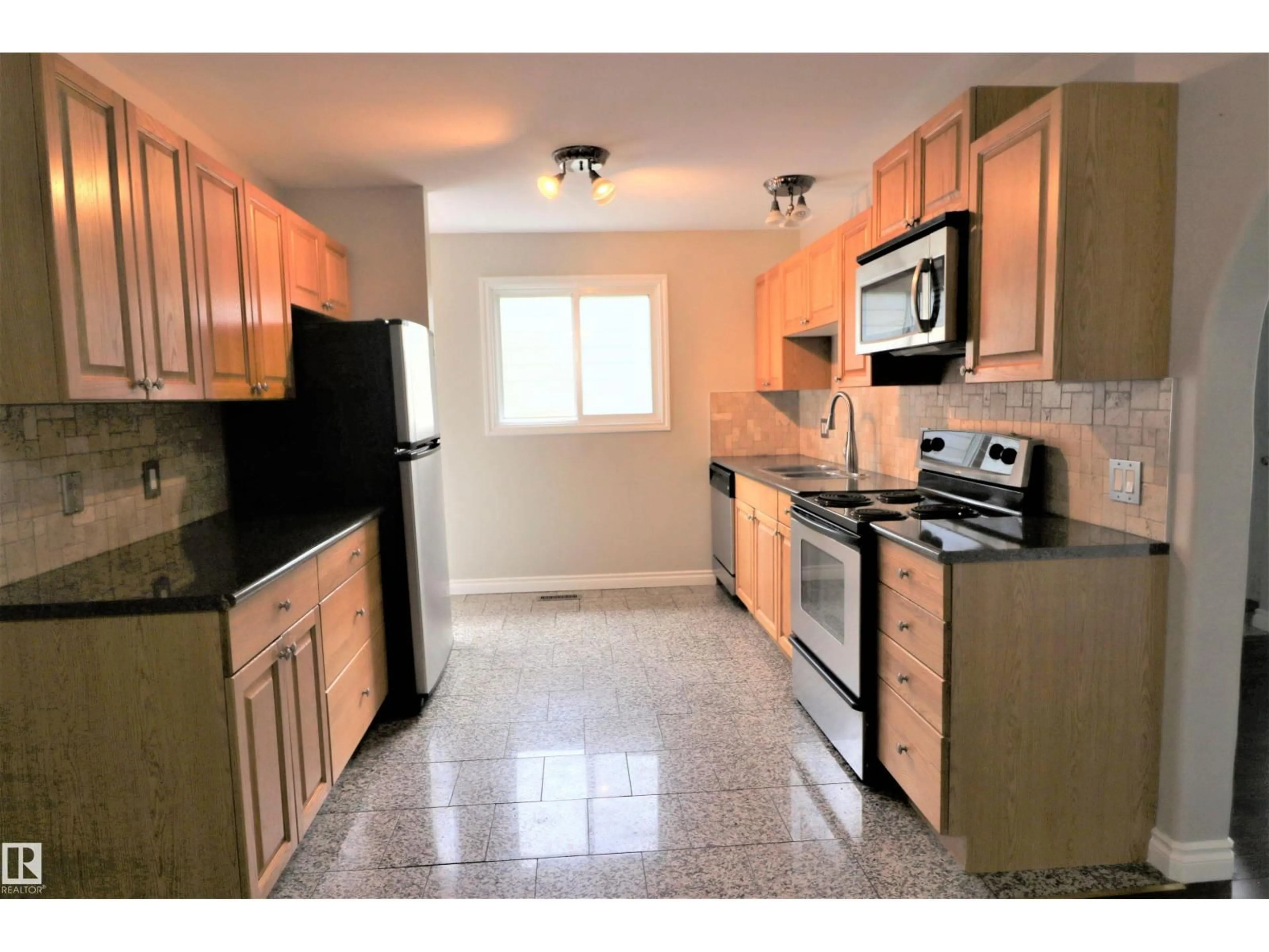 Standard kitchen, ceramic/tile floor for 4317 54 ST, Beaumont Alberta T4X1C6