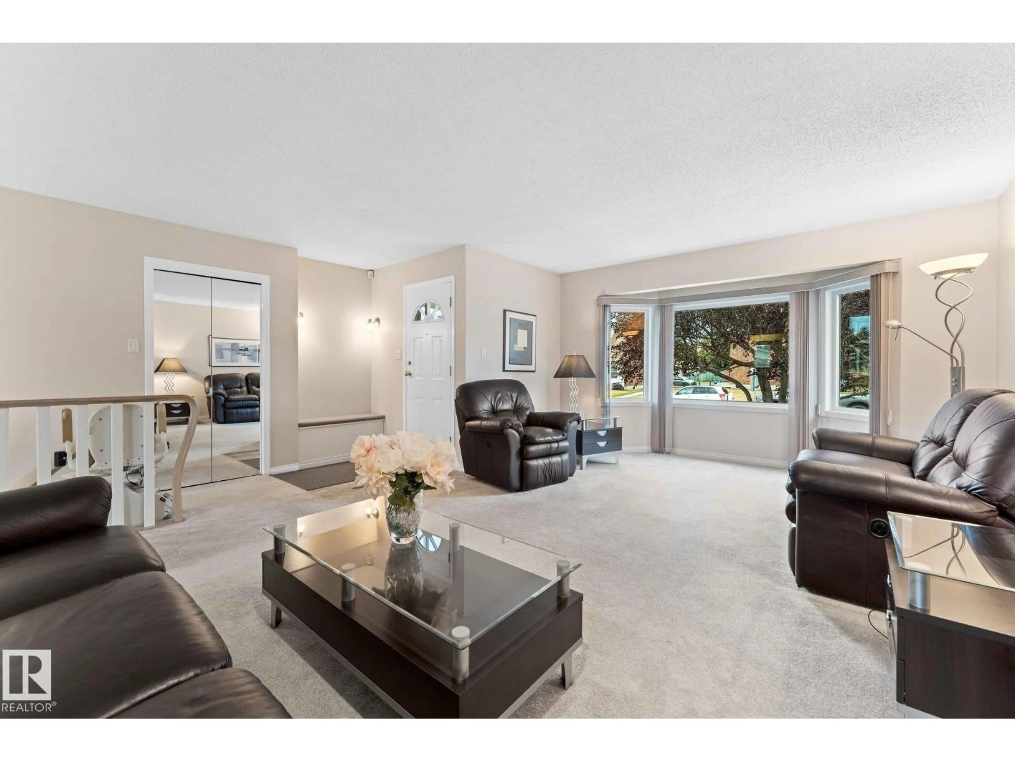 Living room with furniture, ceramic/tile floor for 303 KNOTTWOOD RD RD, Edmonton Alberta T6K2G5