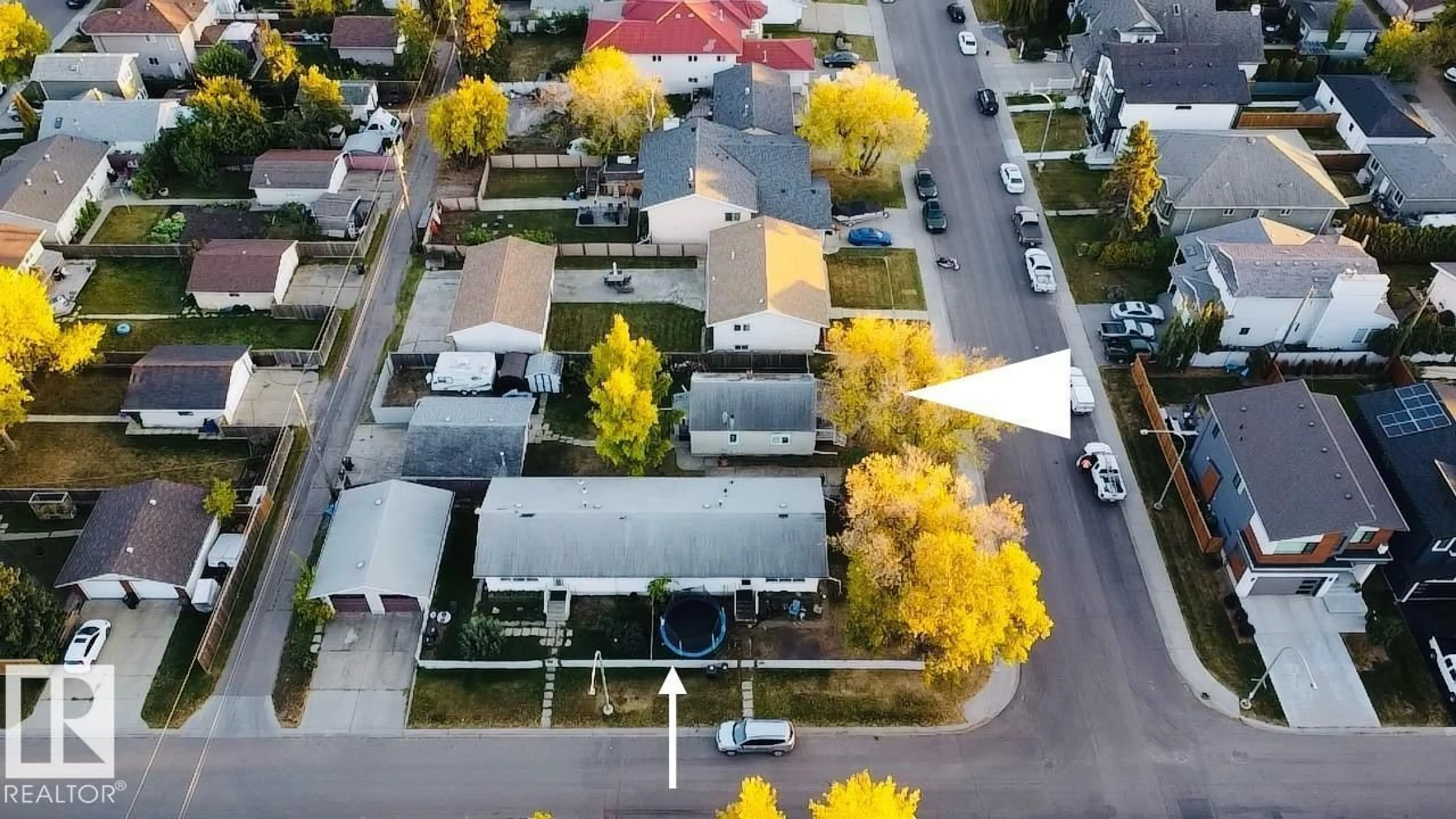 A pic from outside/outdoor area/front of a property/back of a property/a pic from drone, street for 15131 99 AVE, Edmonton Alberta T5P1X2