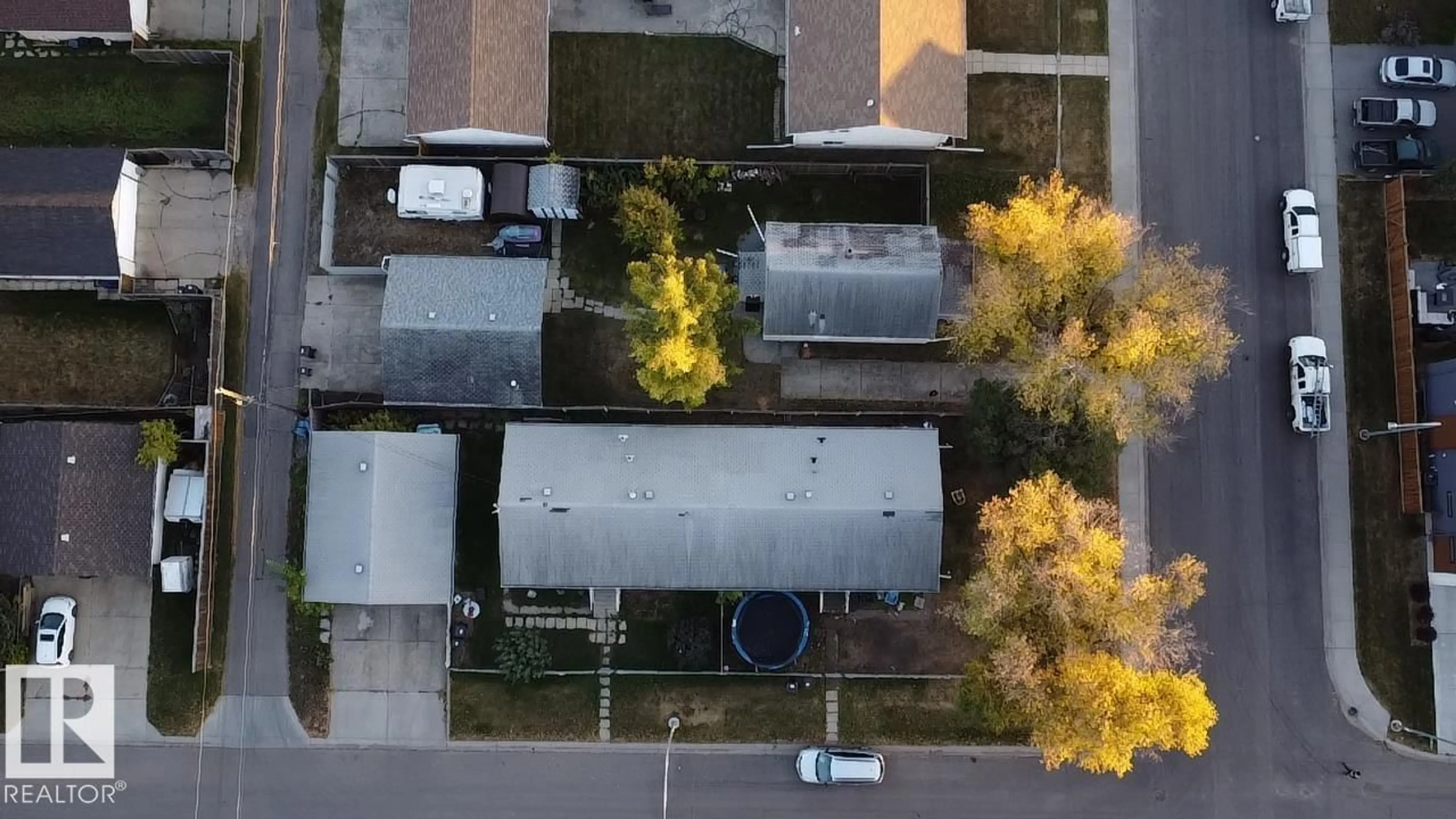A pic from outside/outdoor area/front of a property/back of a property/a pic from drone, street for 15131 99 AVE, Edmonton Alberta T5P1X2