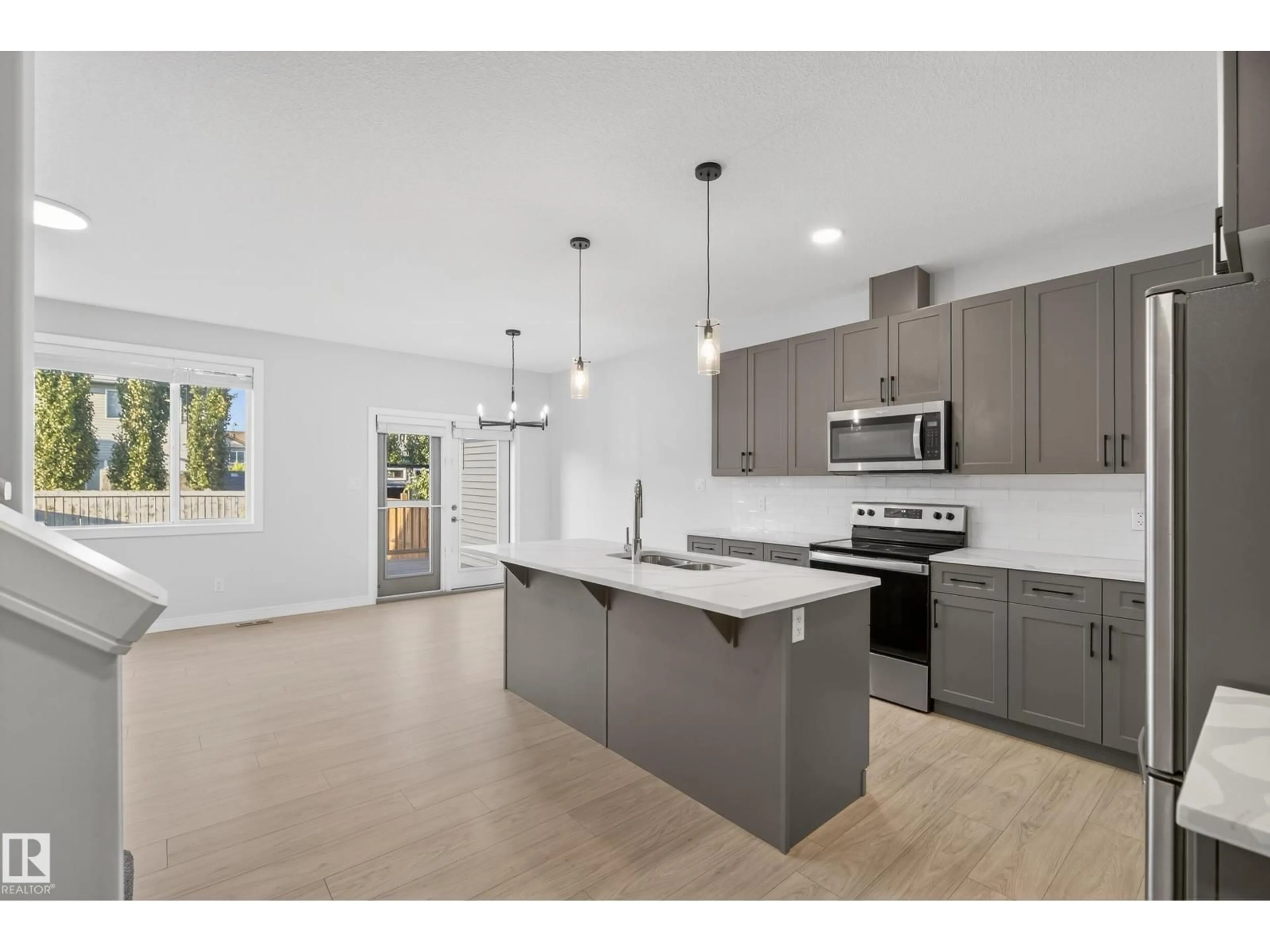 Open concept kitchen, ceramic/tile floor for 84 MEADOWLAND CR, Spruce Grove Alberta T7X0A6