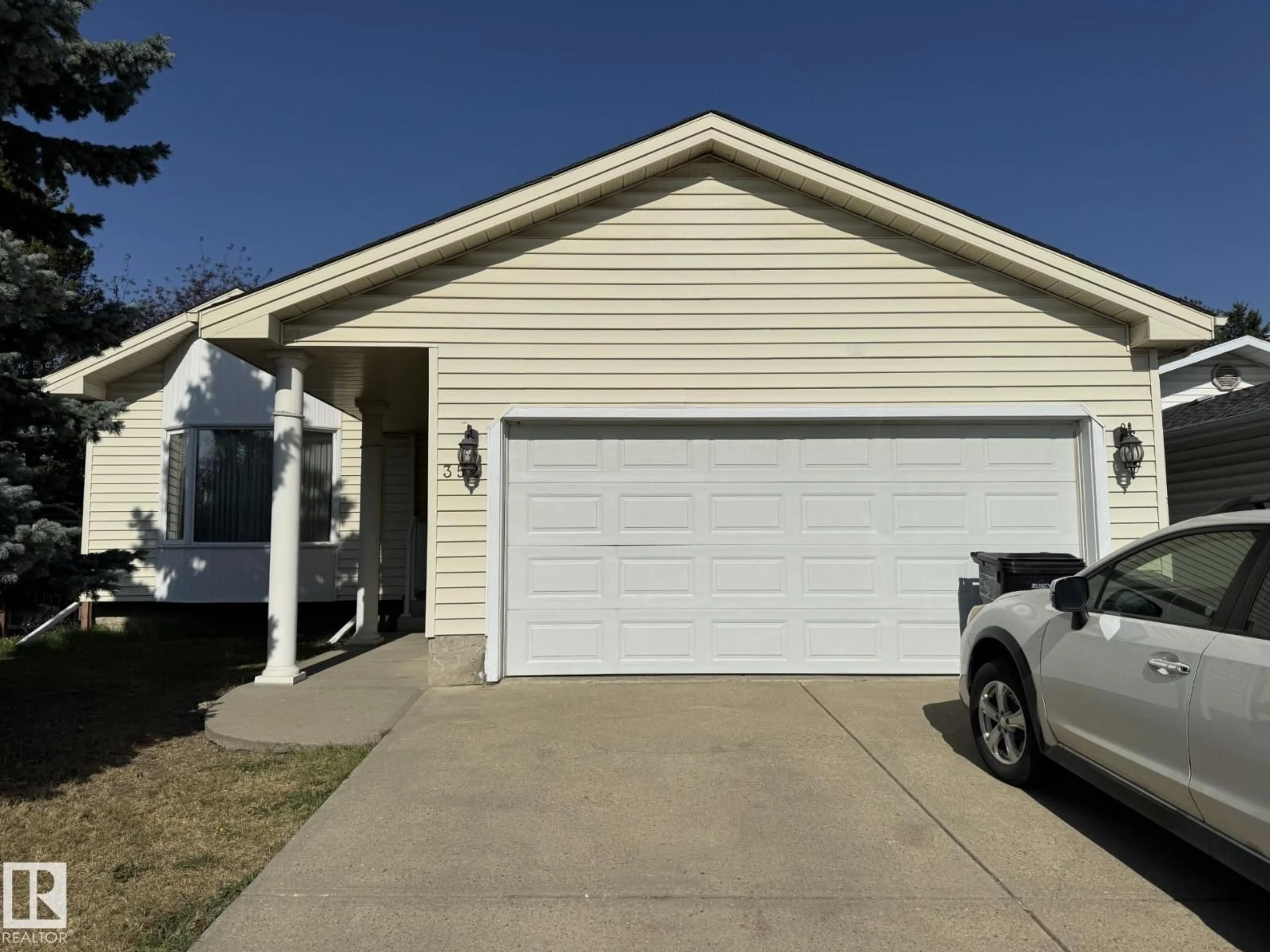 Home with vinyl exterior material, street for 352 WARWICK RD, Edmonton Alberta T5X5N4