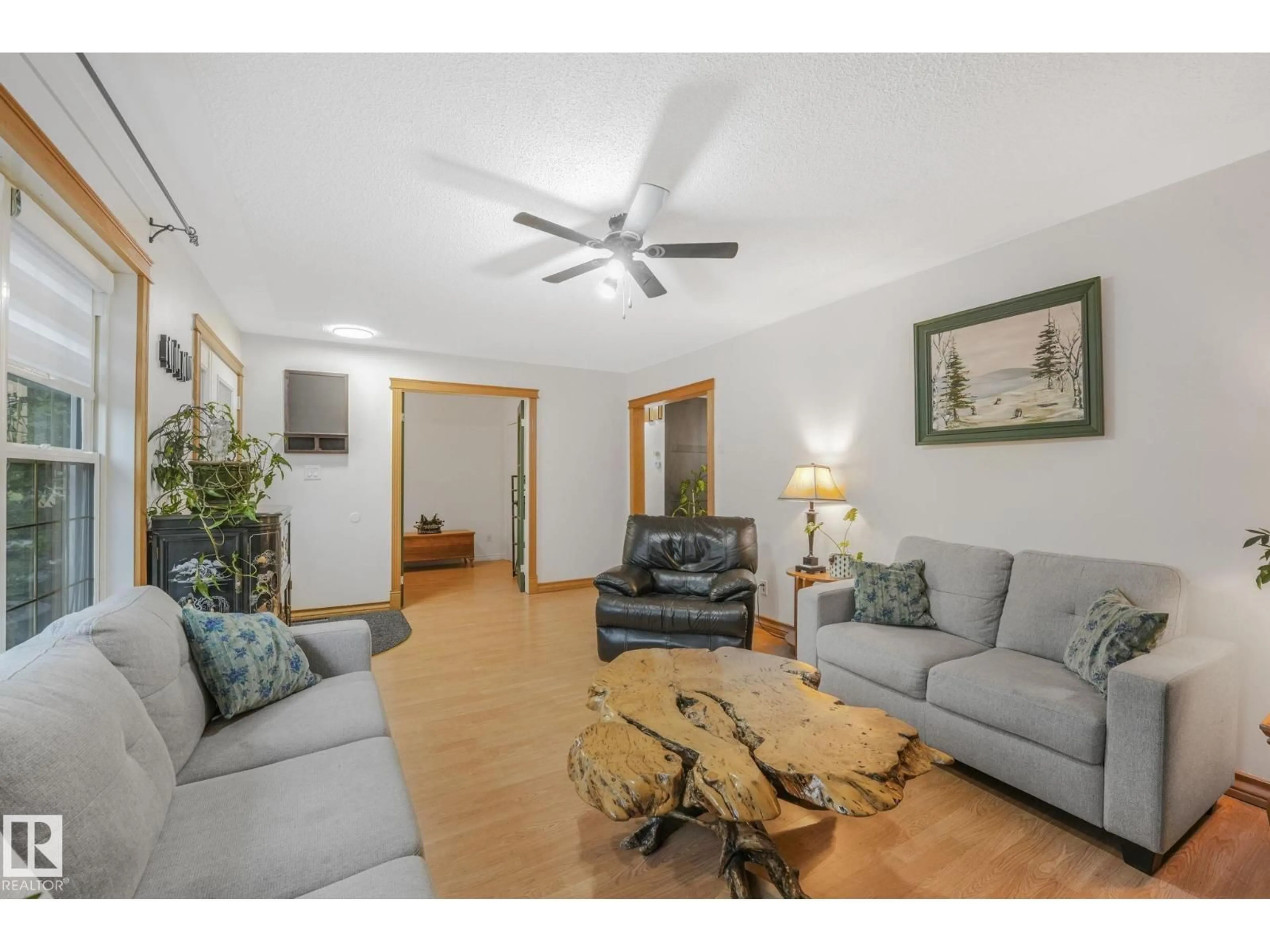 Living room with furniture, wood/laminate floor for 135 MARION DR, Sherwood Park Alberta T8A8A2