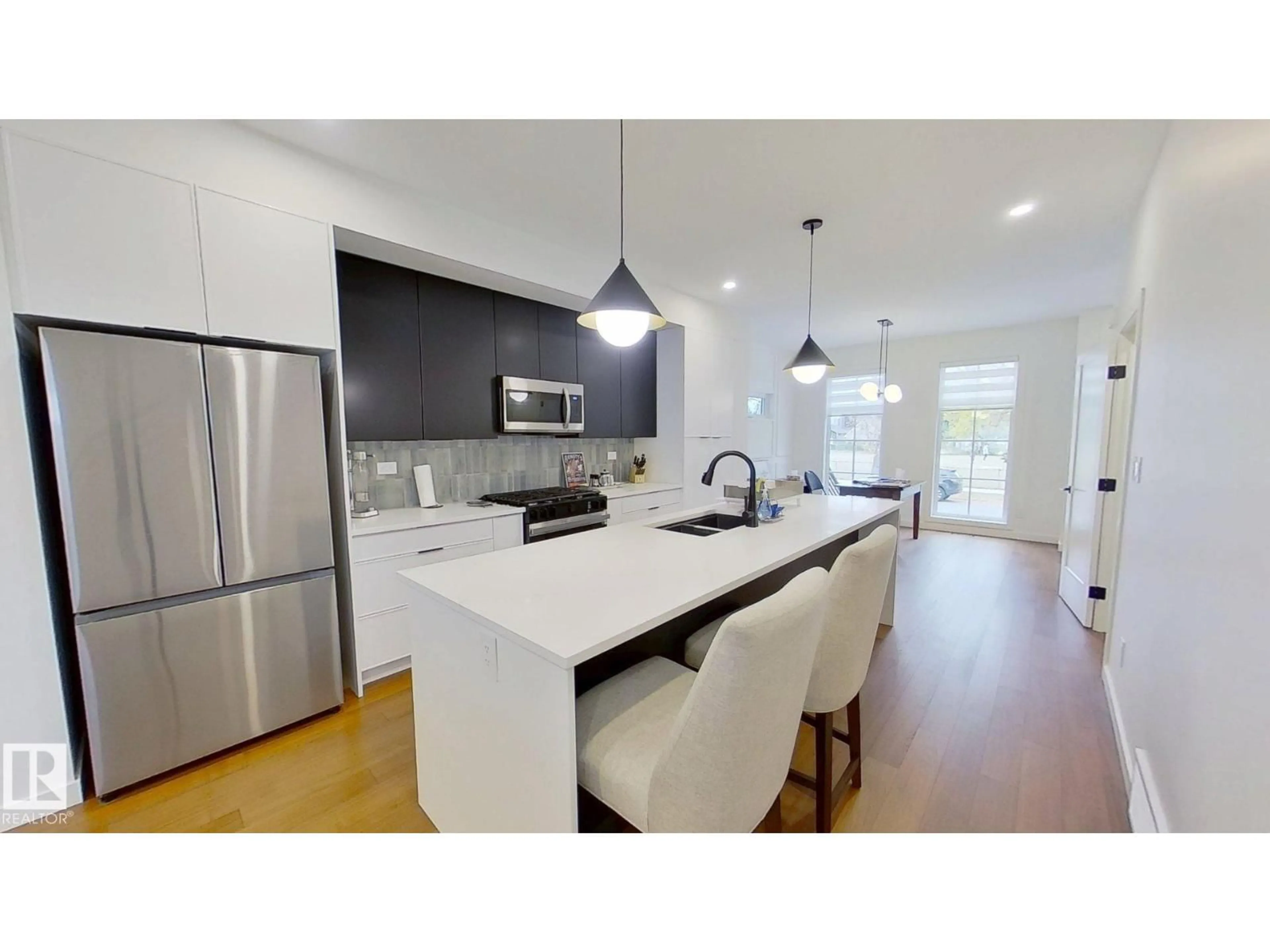 Open concept kitchen, unknown for 11308 128 ST NW, Edmonton Alberta T5M0W9
