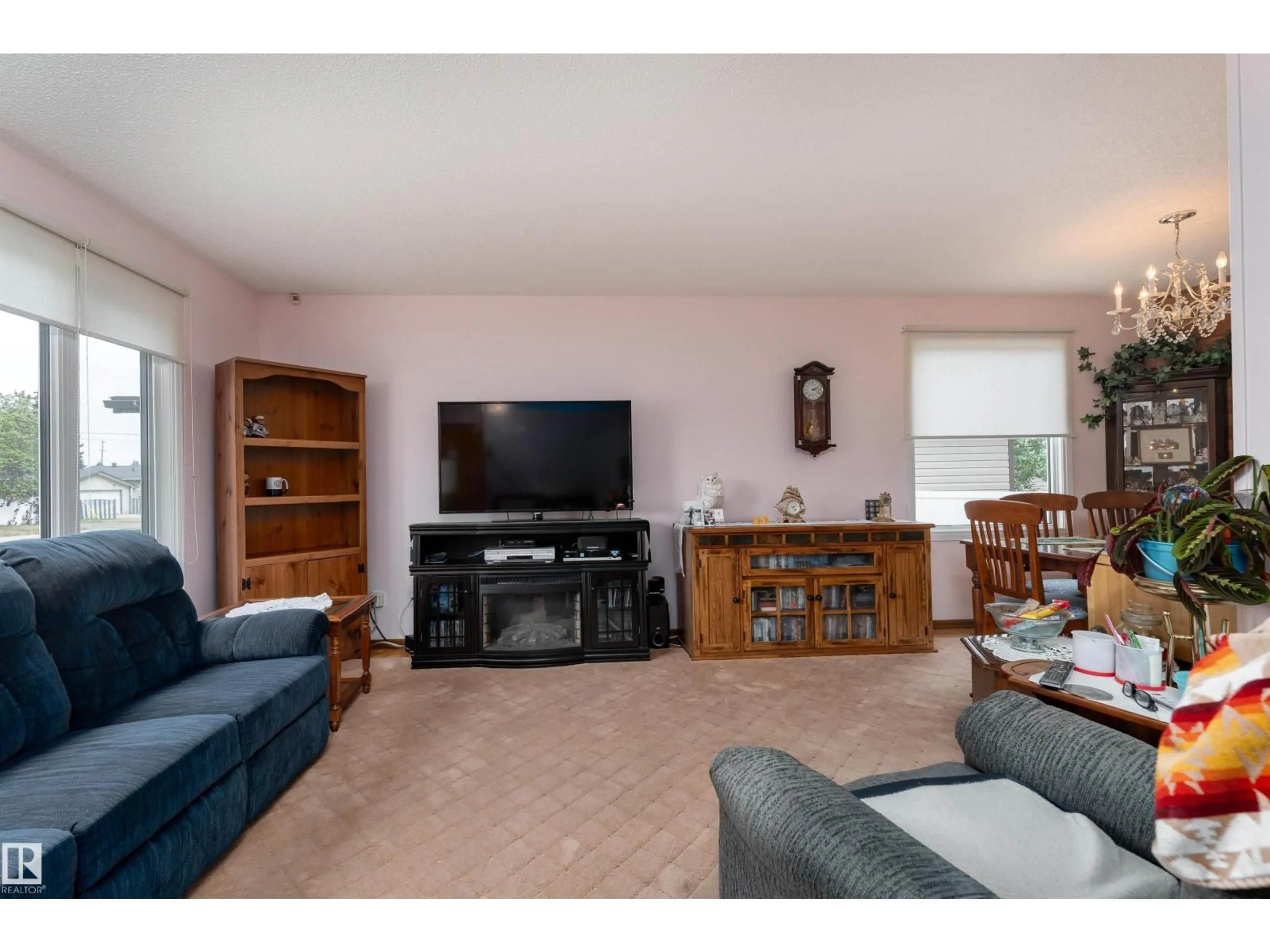 Living room with furniture, unknown for 8411 135 AV, Edmonton Alberta T5E1M9