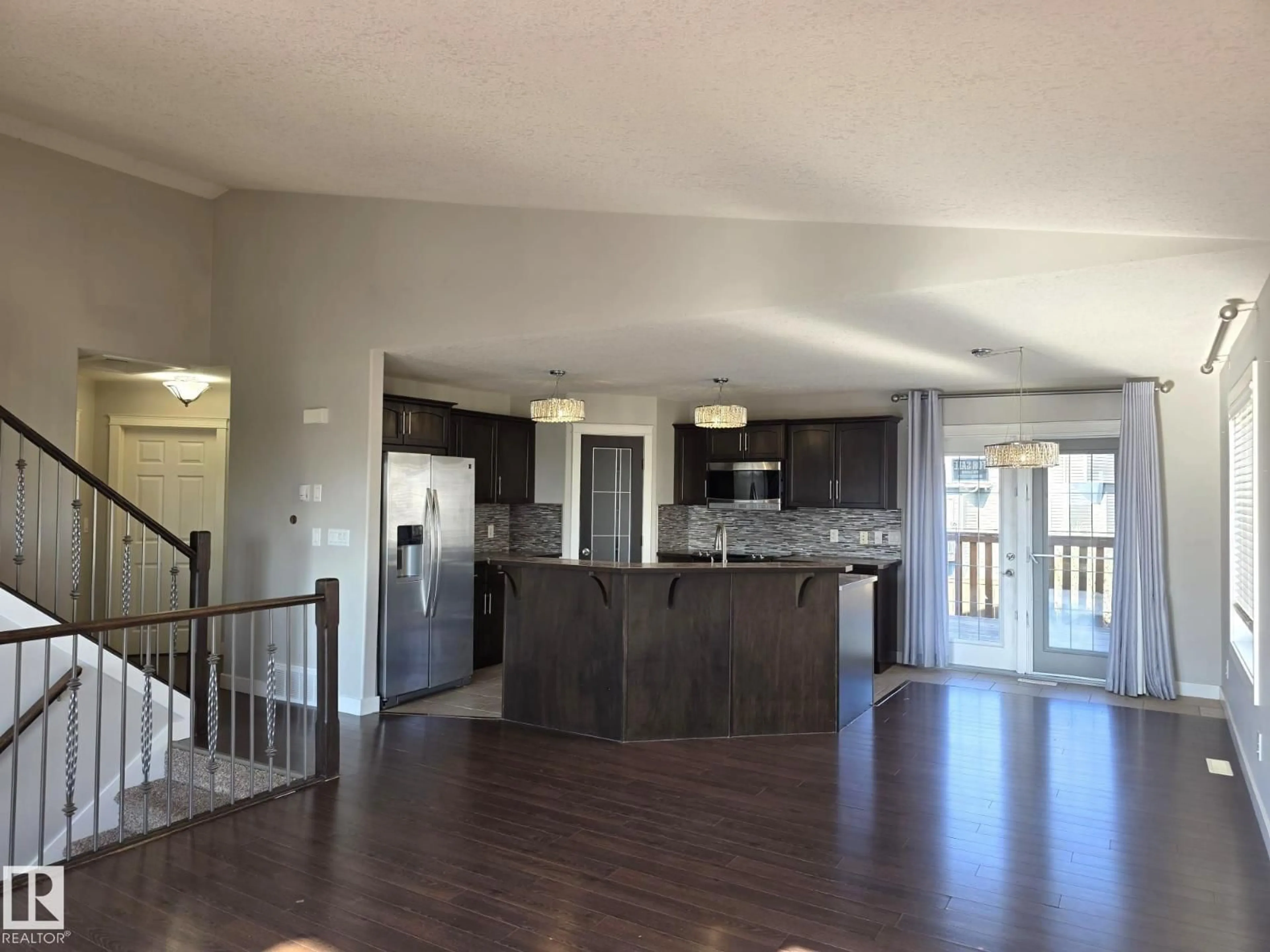 Open concept kitchen, wood/laminate floor for 4116 41 ST, Drayton Valley Alberta T7A1S2