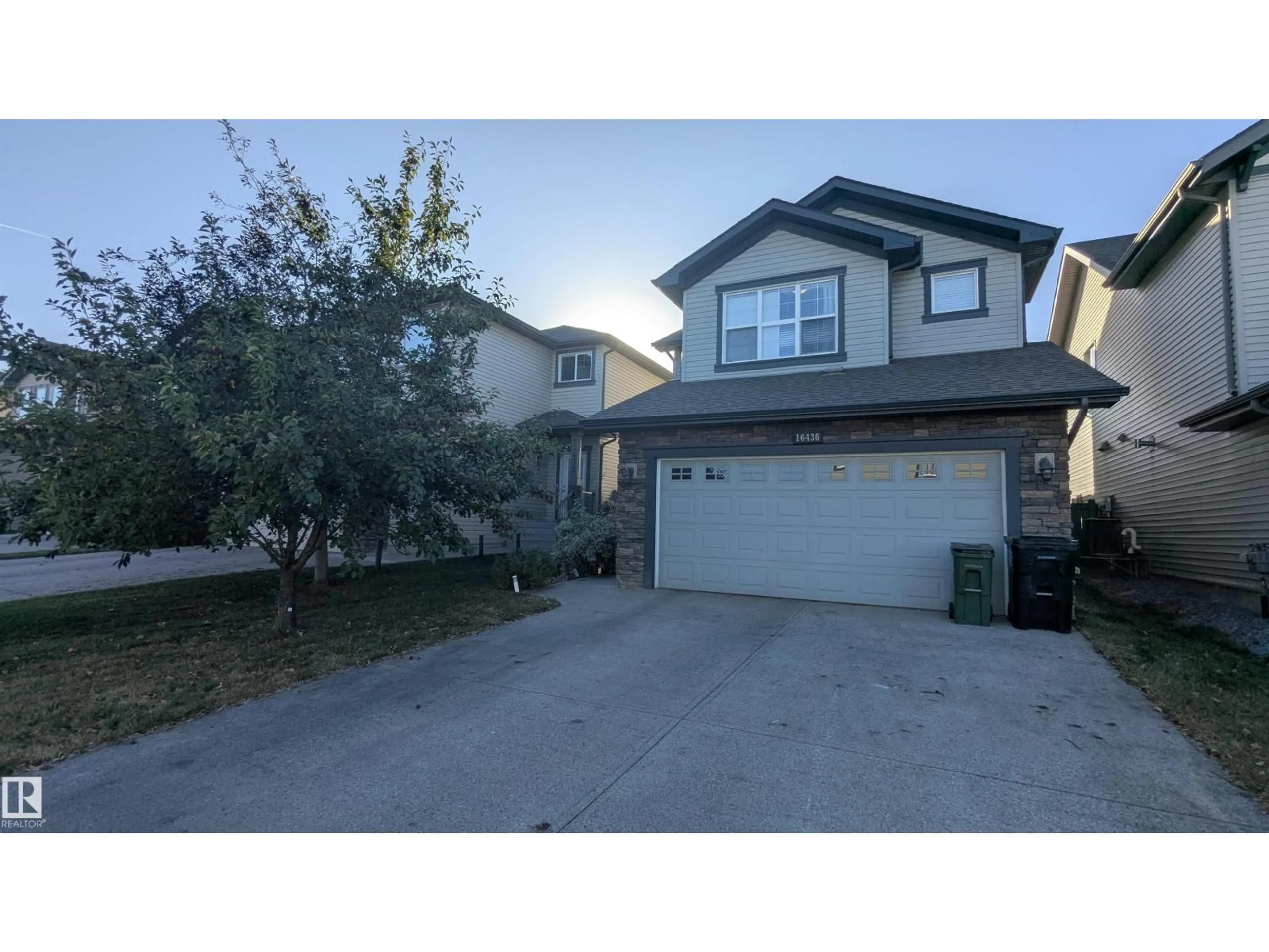 Home with vinyl exterior material, street for 16436 136 ST, Edmonton Alberta T6V0G8