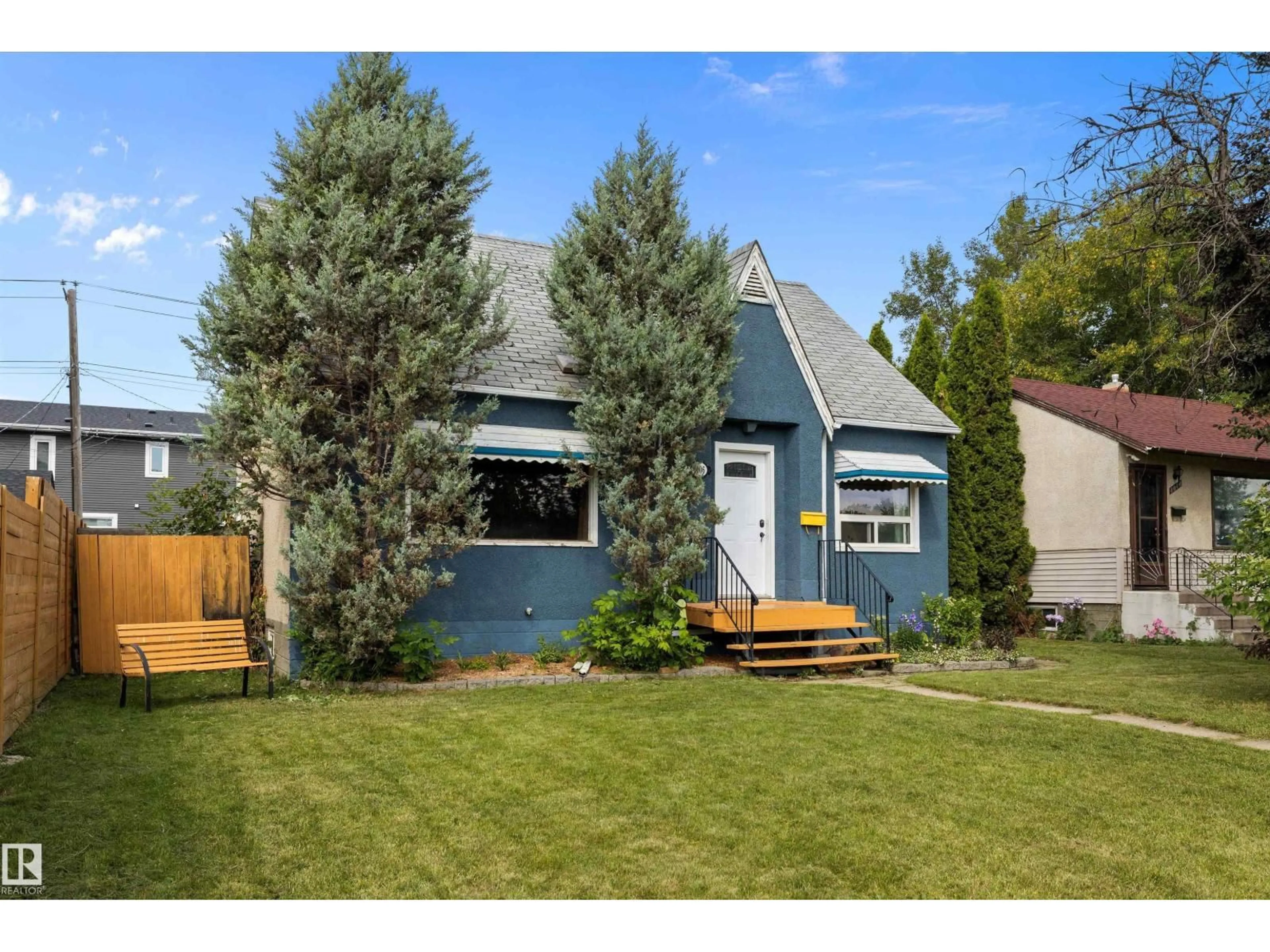 Home with vinyl exterior material, street for 8006 75 ST, Edmonton Alberta T6C2G7