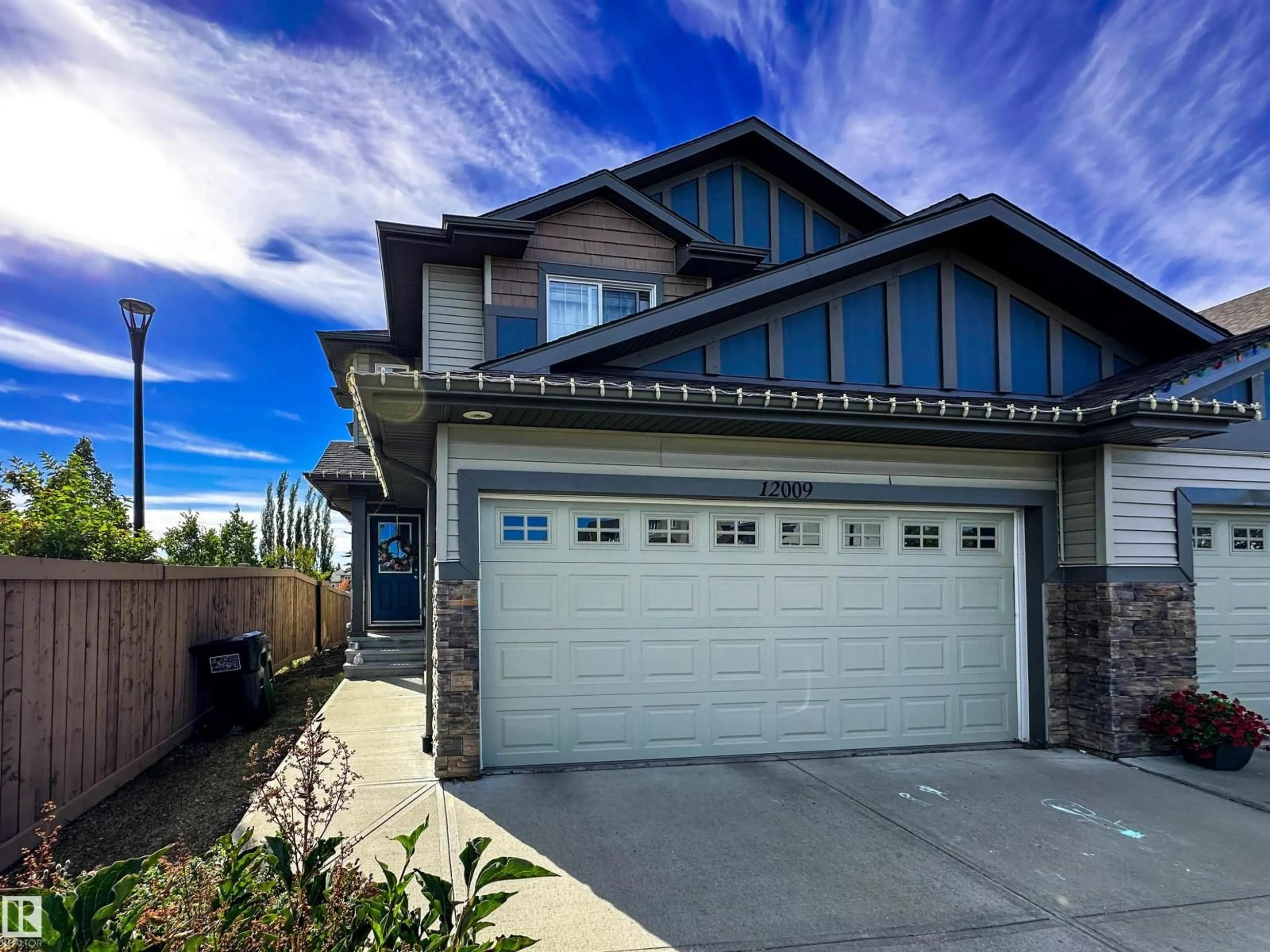Home with vinyl exterior material, street for 12009 167A AV, Edmonton Alberta T5X0G5
