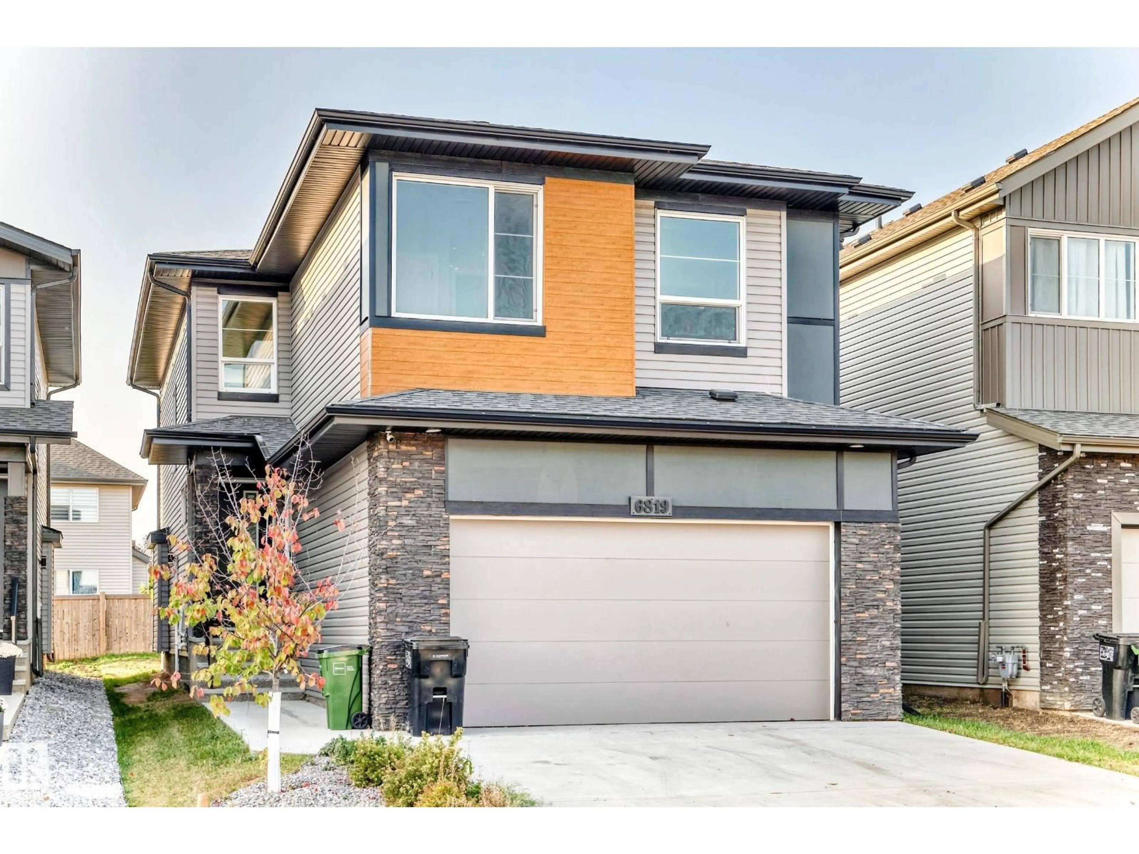 Home with vinyl exterior material, street for 6819 171 AV, Edmonton Alberta T5Z0W2