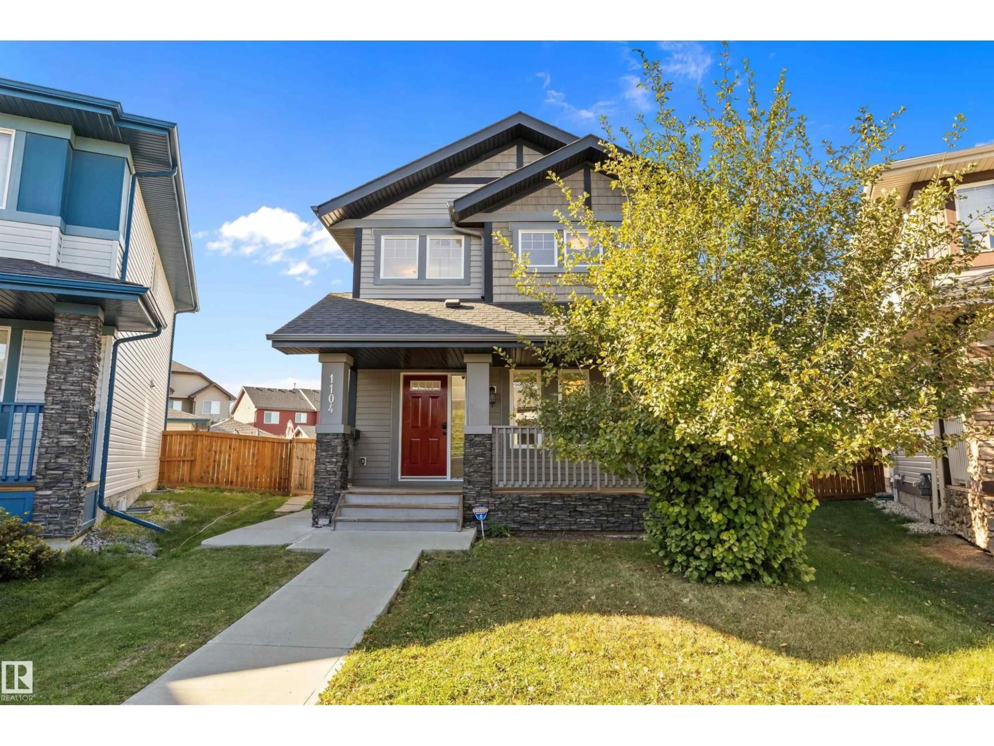 Home with vinyl exterior material, street for SW - 1104 161 ST, Edmonton Alberta T6W2H6