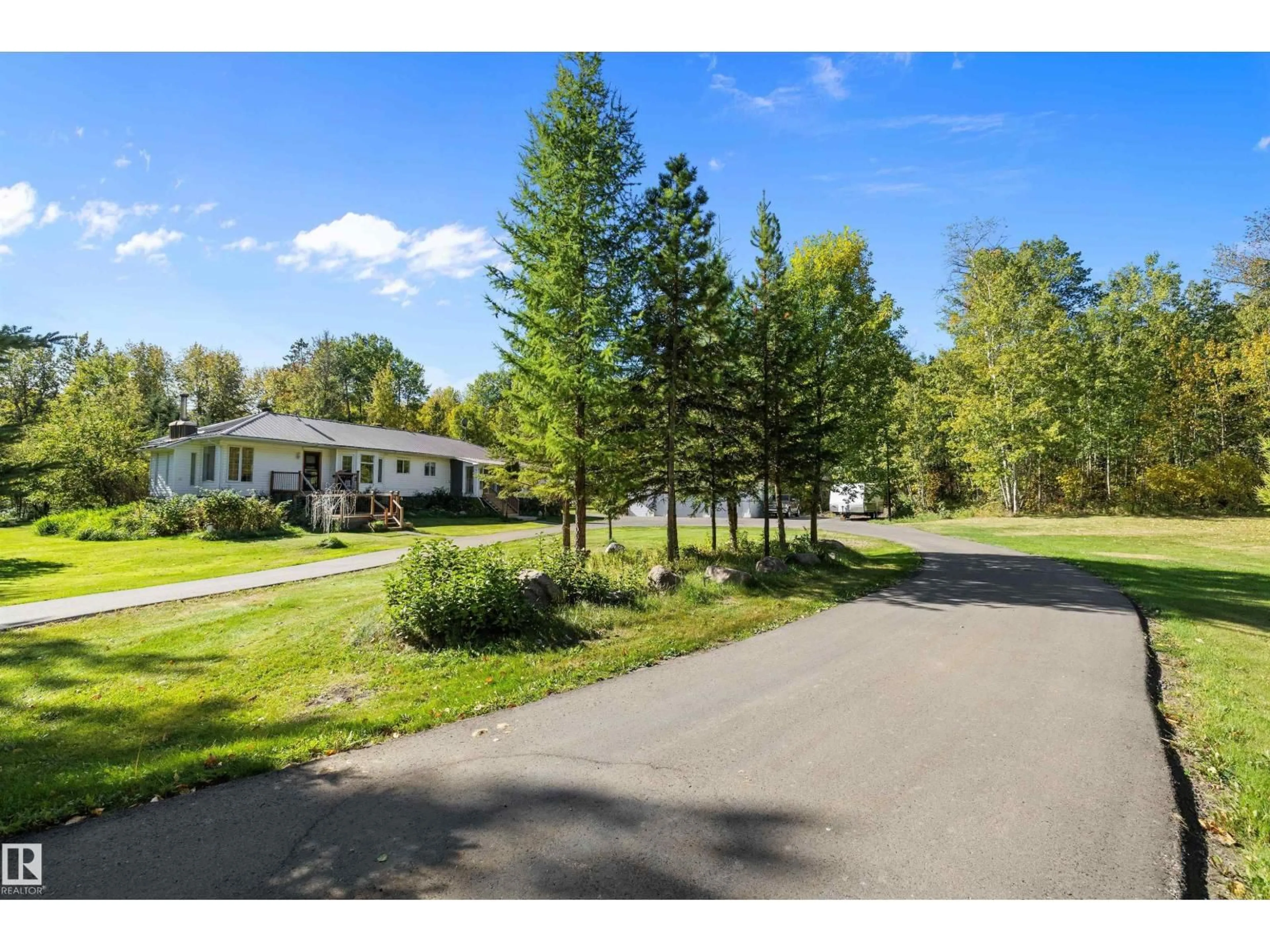 A pic from outside/outdoor area/front of a property/back of a property/a pic from drone, unknown for #4 - 54113 RGE ROAD 13, Rural Parkland County Alberta T7Y0J2