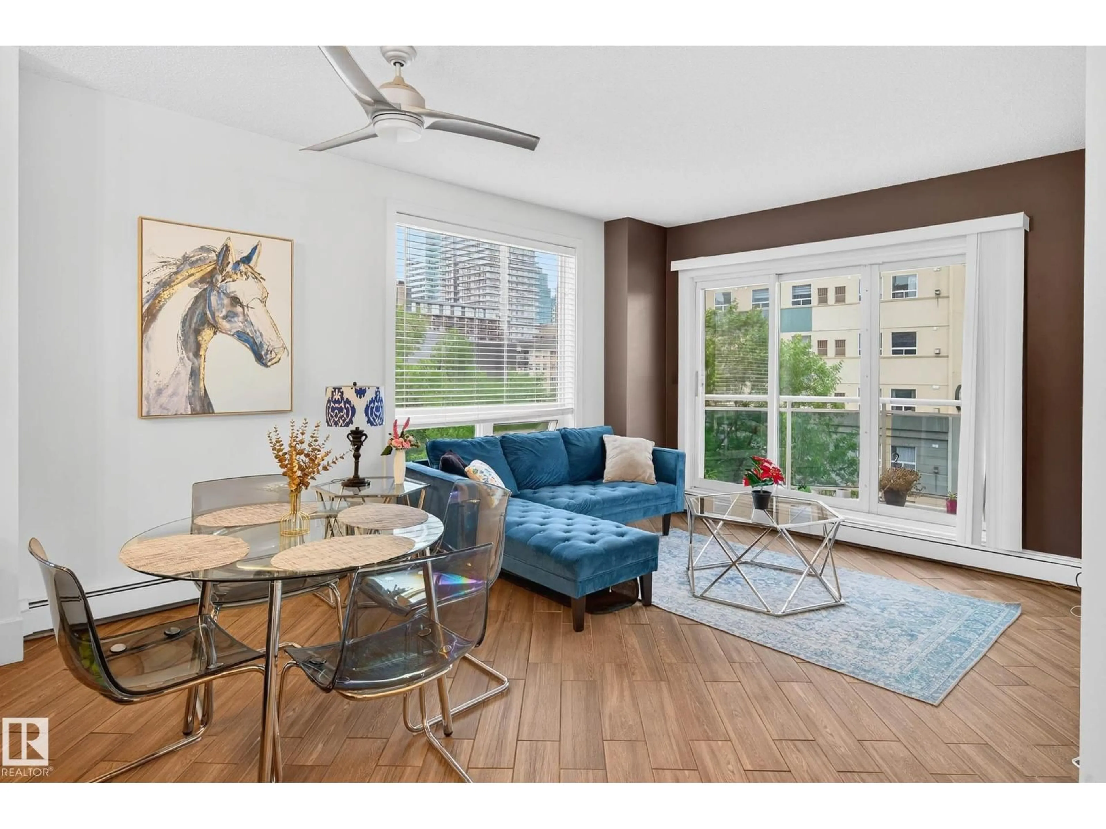 Living room with furniture, wood/laminate floor for #401 - 10504 99 AV, Edmonton Alberta T5K1B2