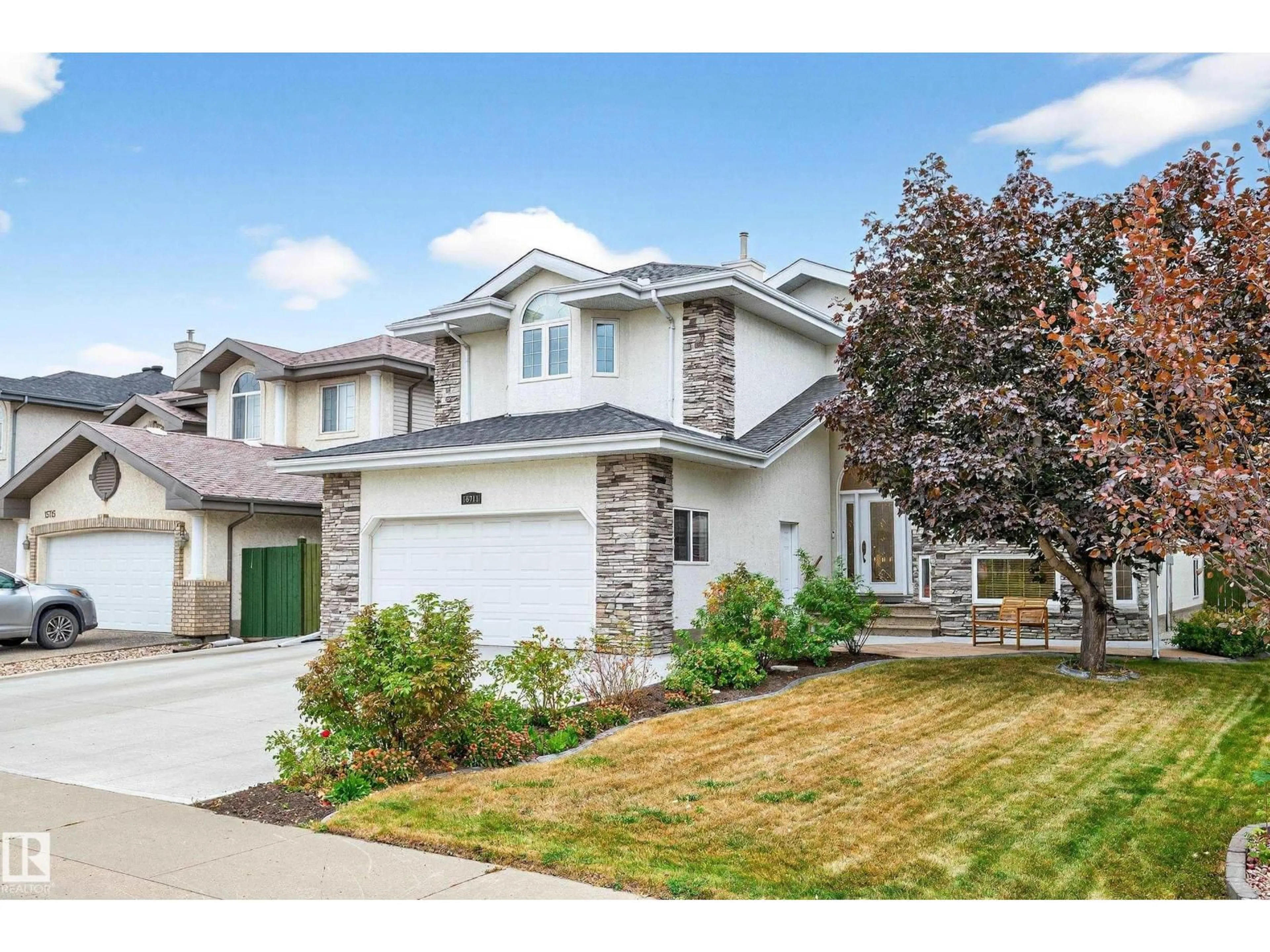 Home with vinyl exterior material, street for NW - 15711 135 ST, Edmonton Alberta T6V1P6