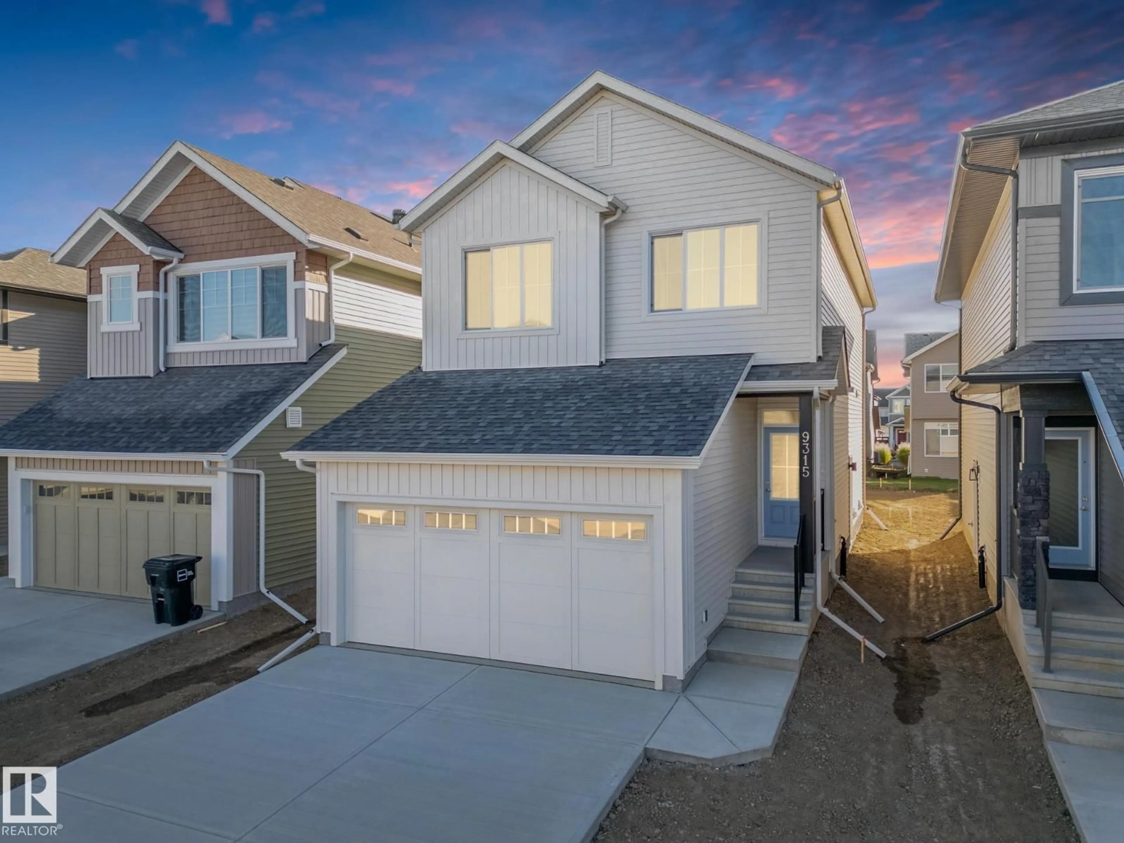 Home with vinyl exterior material, street for NW - 9315 227 ST, Edmonton Alberta T5T7V7