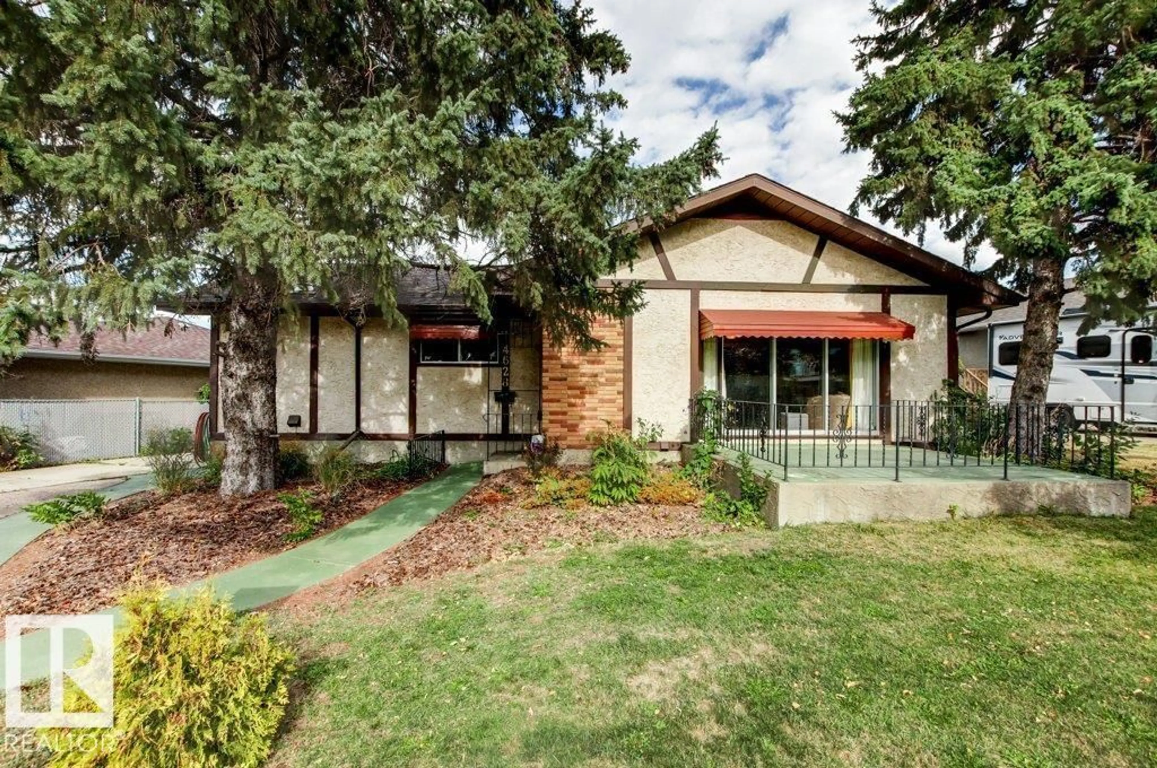 Home with brick exterior material, street for 4628 106A AV, Edmonton Alberta T6A1J4