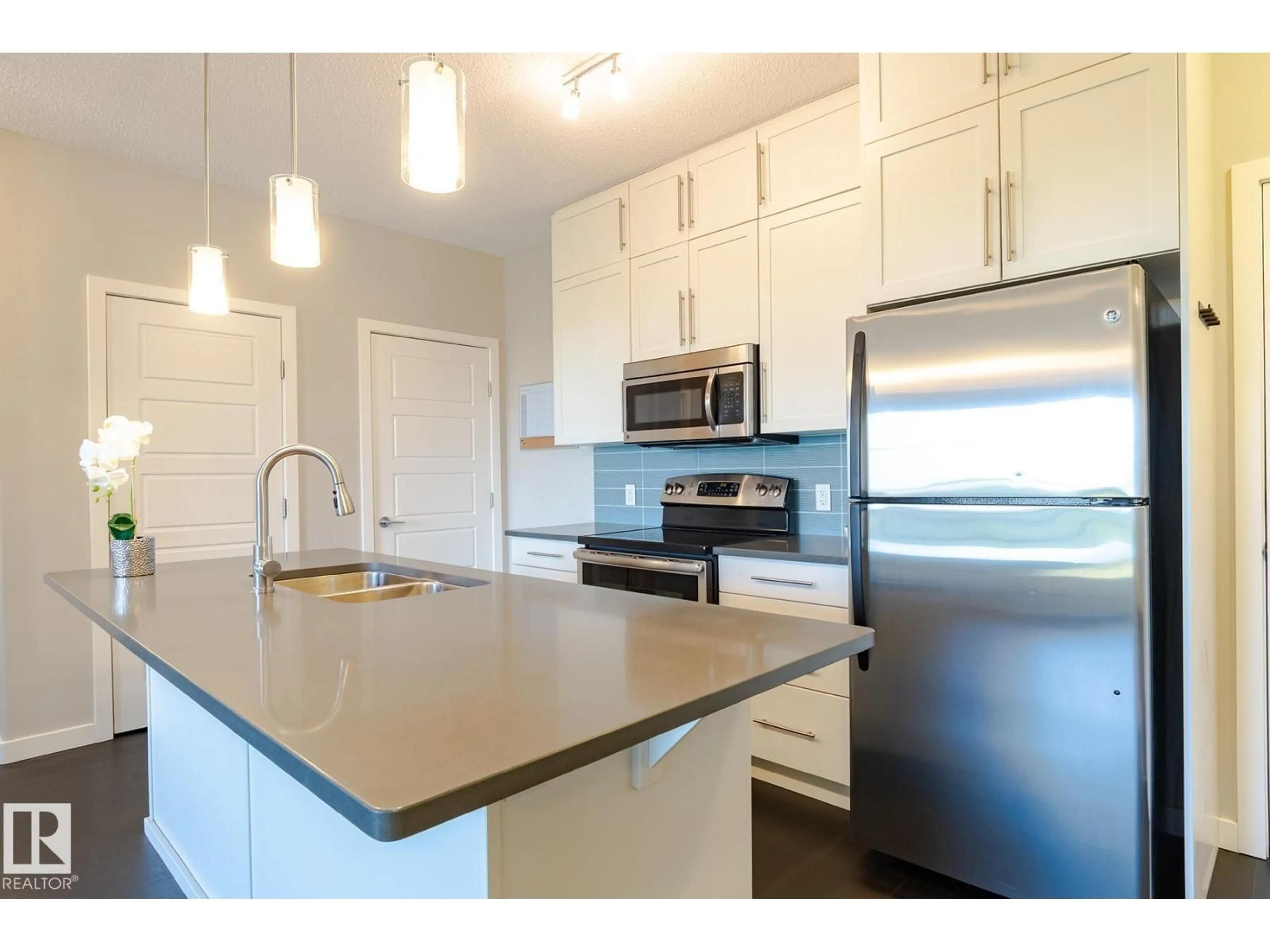 Open concept kitchen, unknown for #406 - 1144 ADAMSON DR, Edmonton Alberta T6W2X7