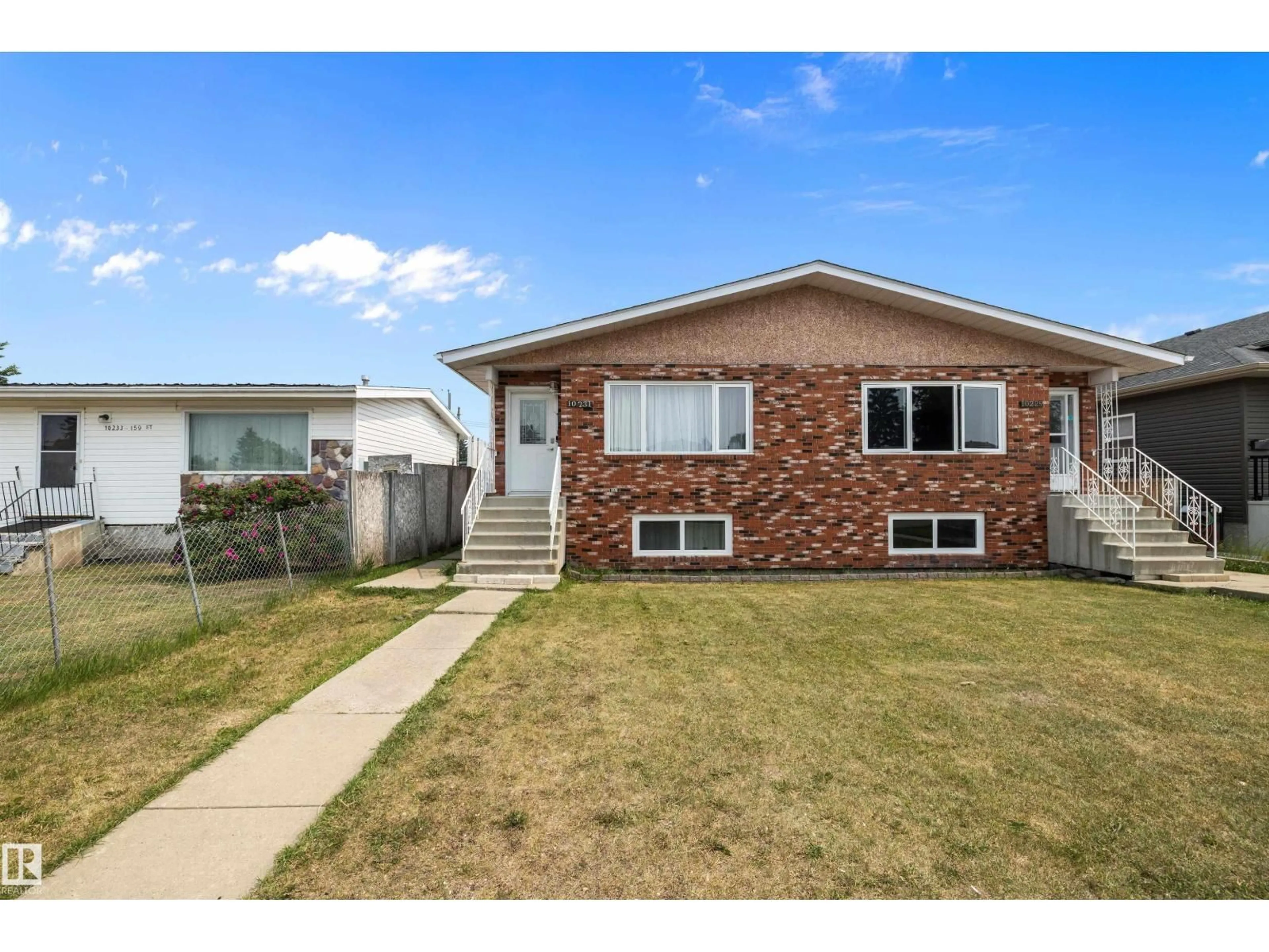 Home with vinyl exterior material, street for NW - 10229/10231 159 ST, Edmonton Alberta T5P3A3