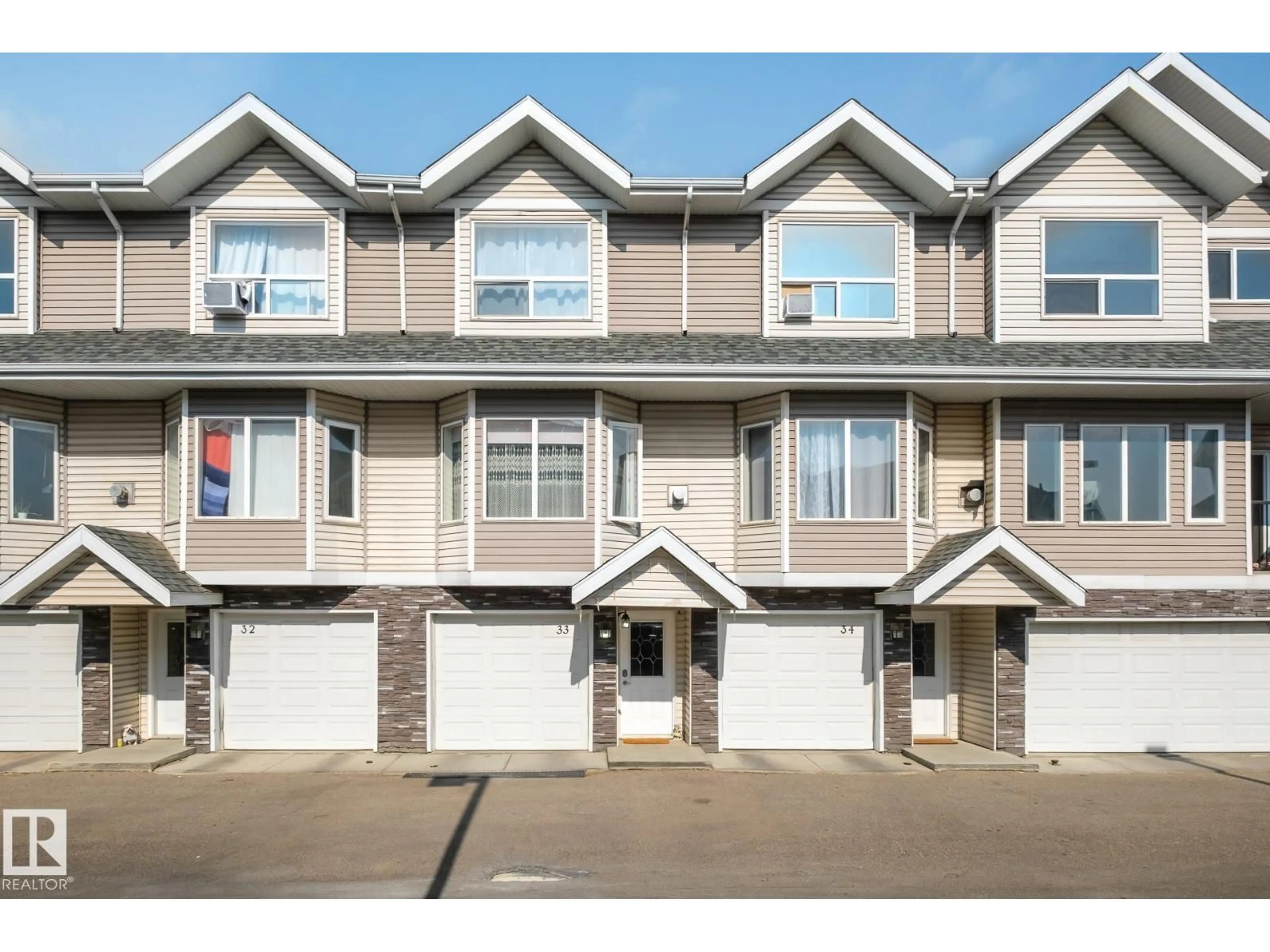 Home with vinyl exterior material, street for 33 - 13215 153 AV, Edmonton Alberta T6V0B6