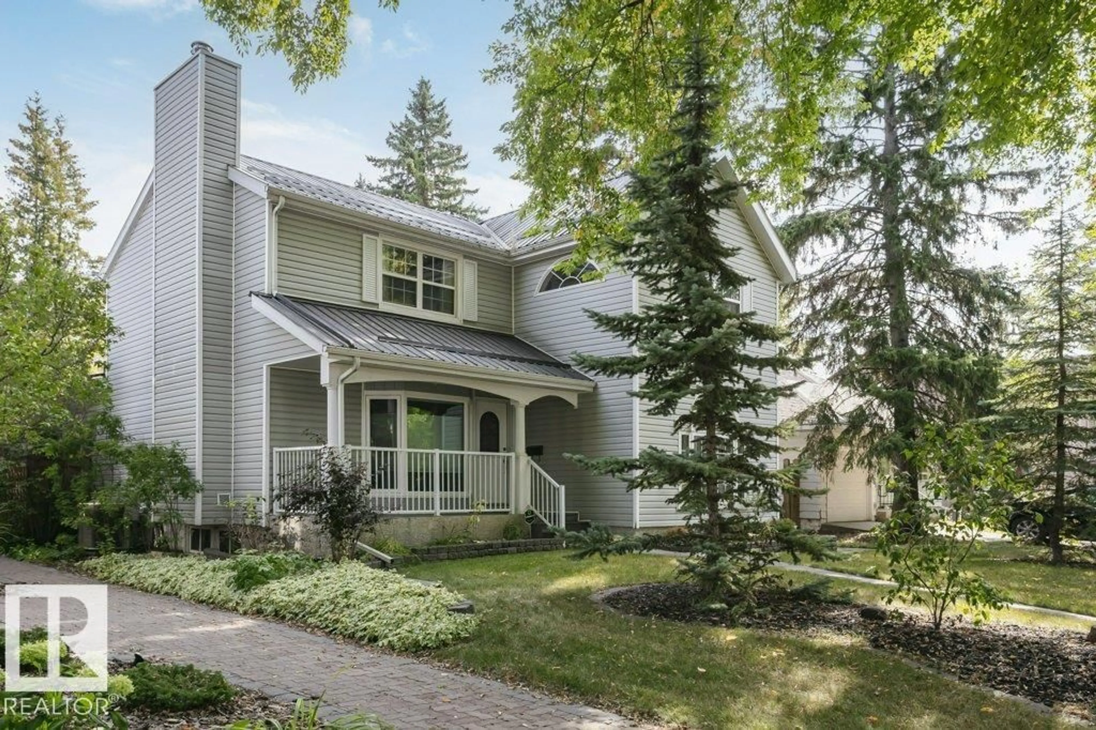 Home with vinyl exterior material, street for NW - 9119 117 ST, Edmonton Alberta T6G1S1