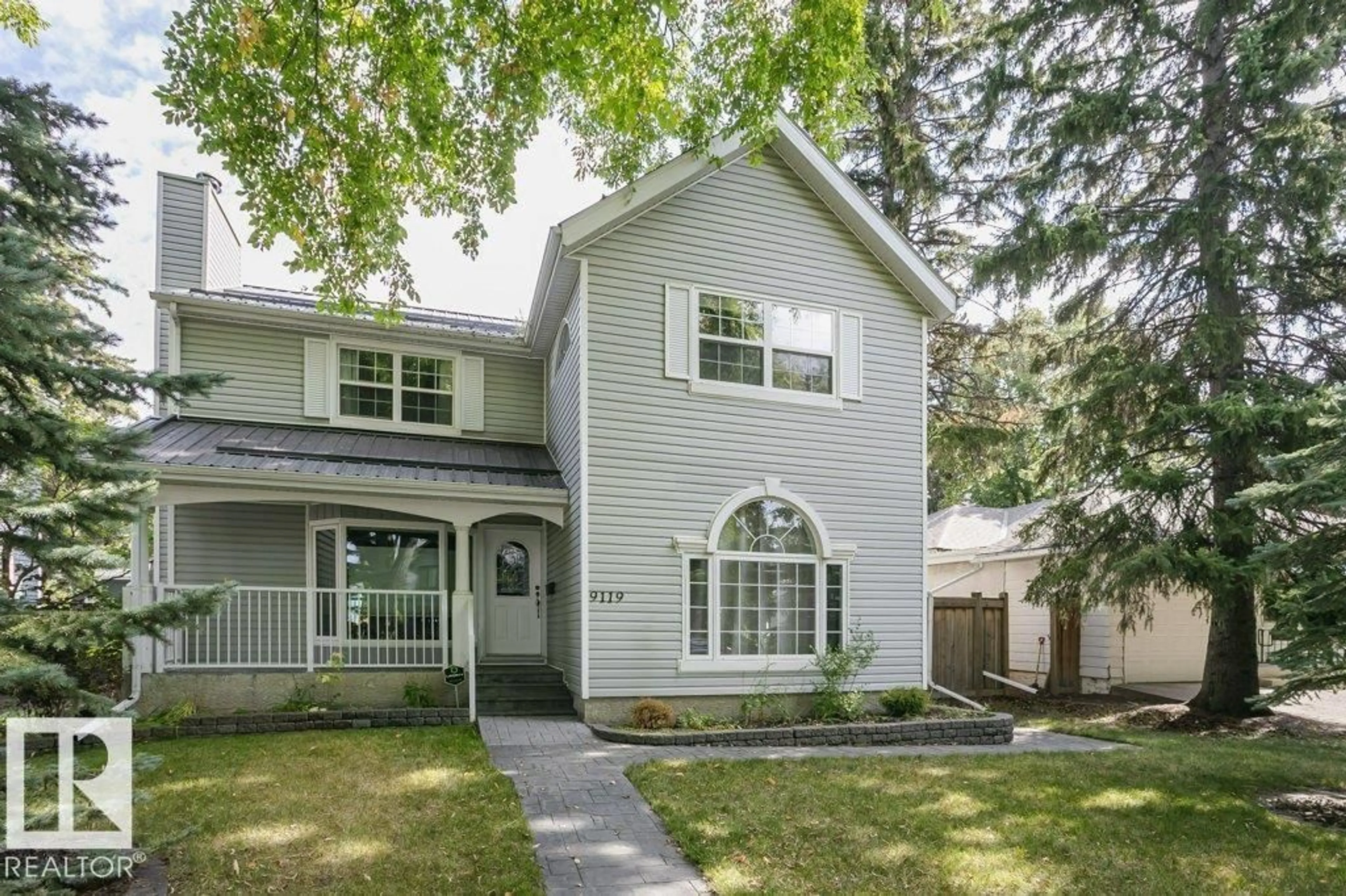 Home with vinyl exterior material, street for NW - 9119 117 ST, Edmonton Alberta T6G1S1