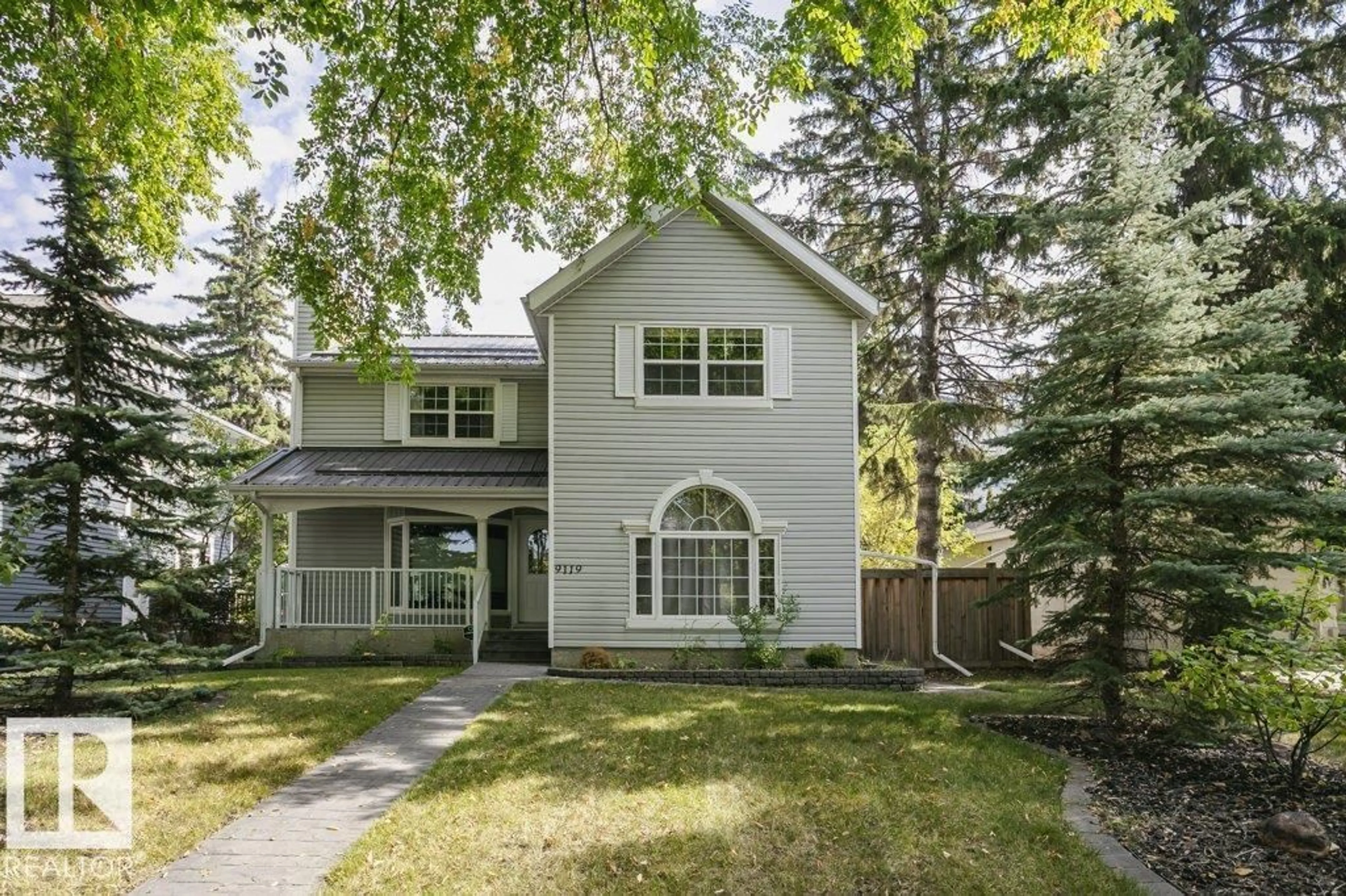 Home with vinyl exterior material, street for NW - 9119 117 ST, Edmonton Alberta T6G1S1