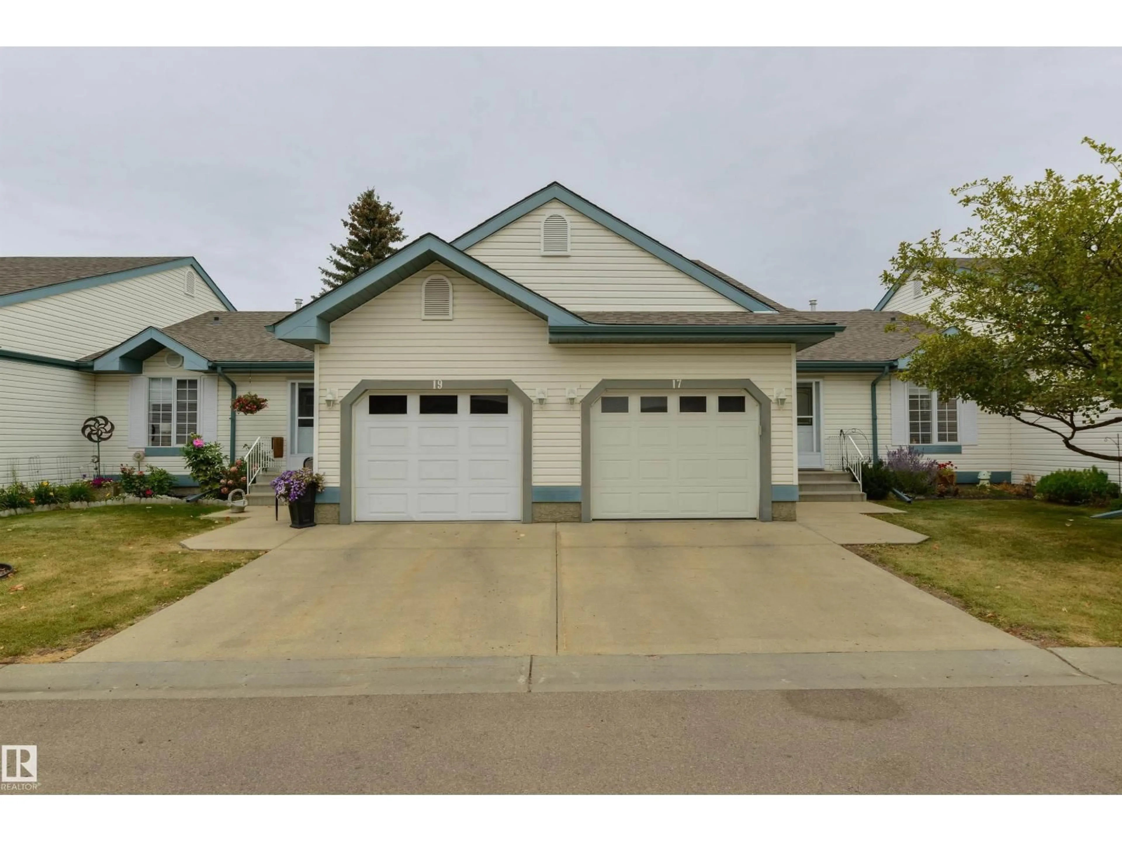Home with vinyl exterior material, street for #17 - 308 JACKSON RD, Edmonton Alberta T6L6W1