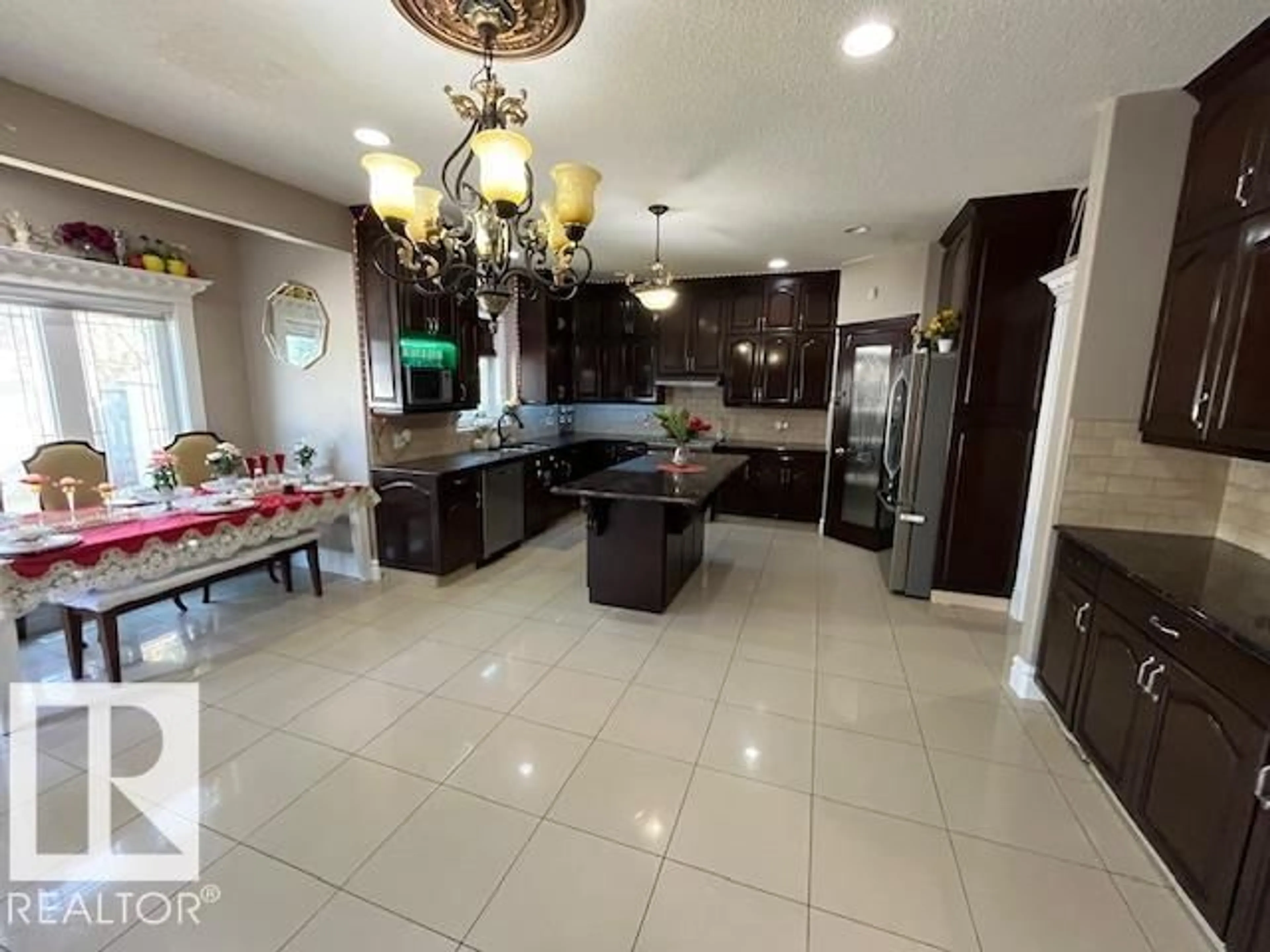 Open concept kitchen, ceramic/tile floor for 17419 110 ST, Edmonton Alberta T5X0B7