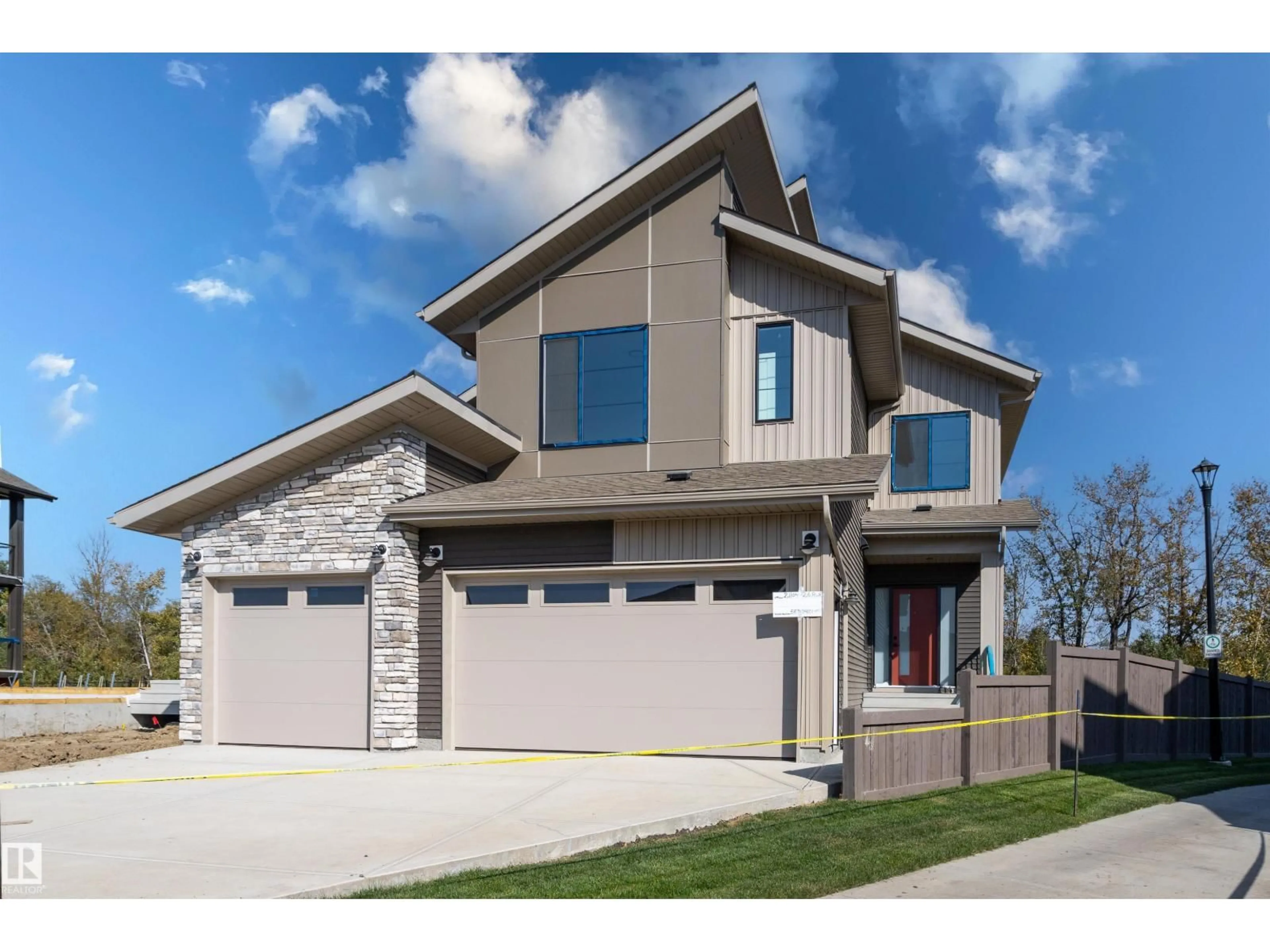 Home with brick exterior material, street for 21104 26 AV, Edmonton Alberta T6M3H2