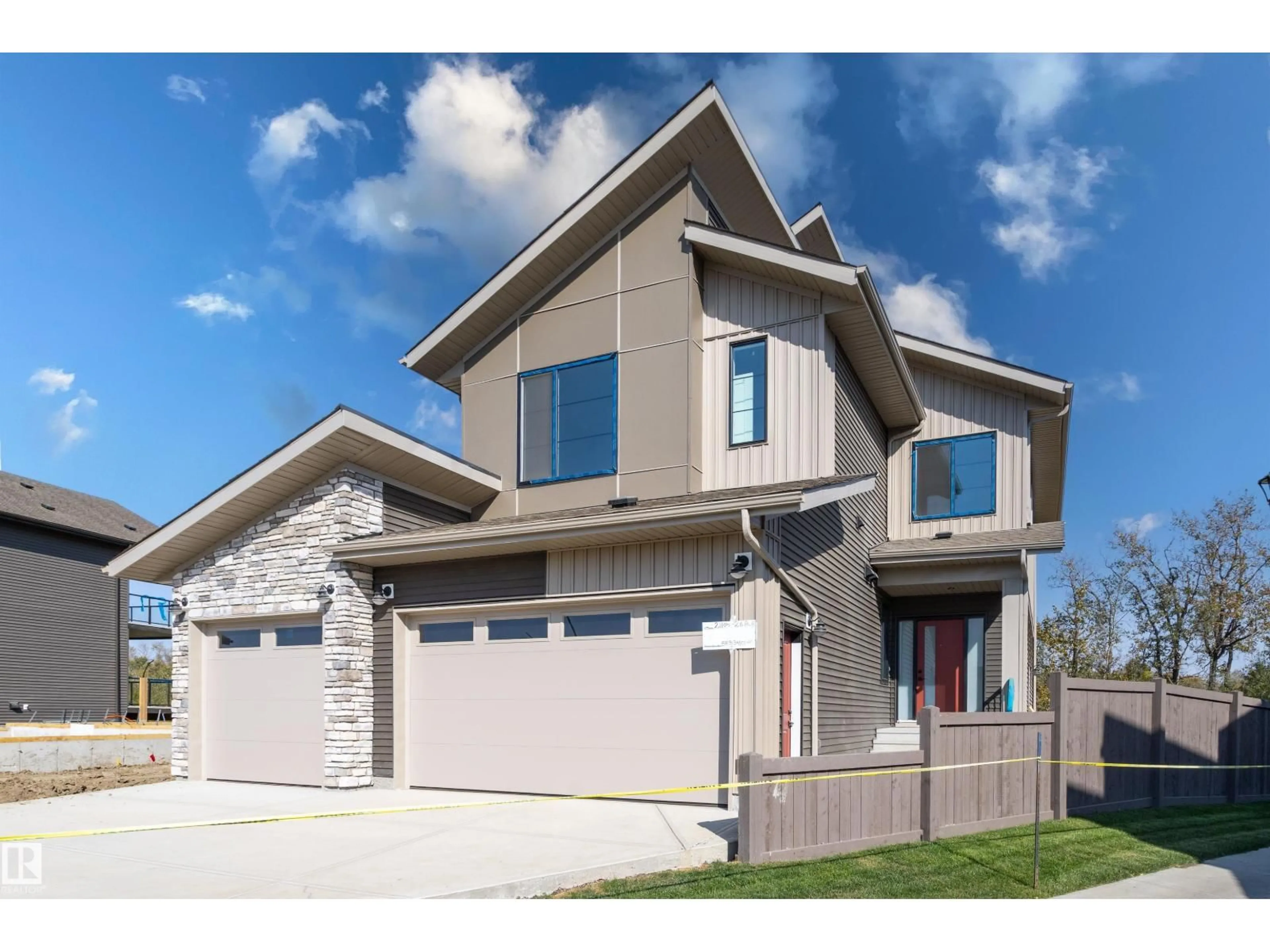 Home with brick exterior material, street for 21104 26 AV, Edmonton Alberta T6M3H2