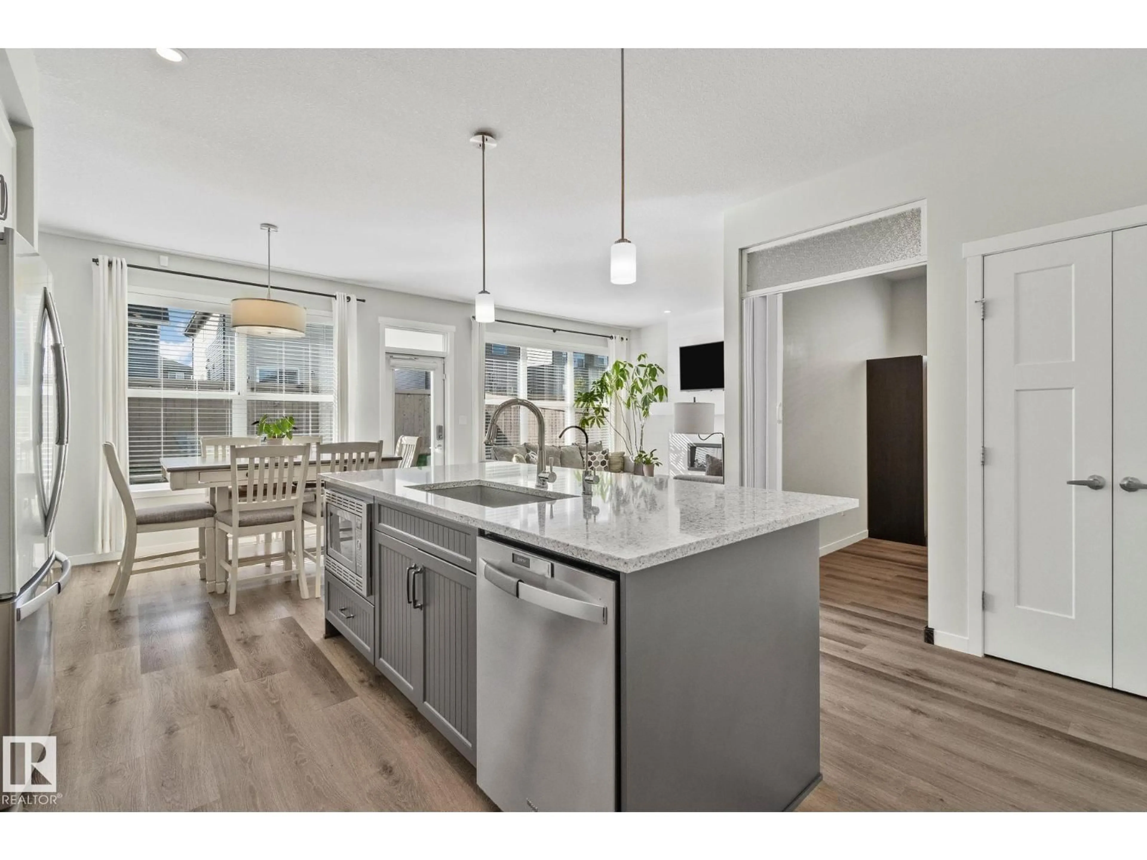 Open concept kitchen, unknown for PM NW - 1093 SECORD PROMENADE, Edmonton Alberta T5T1N1