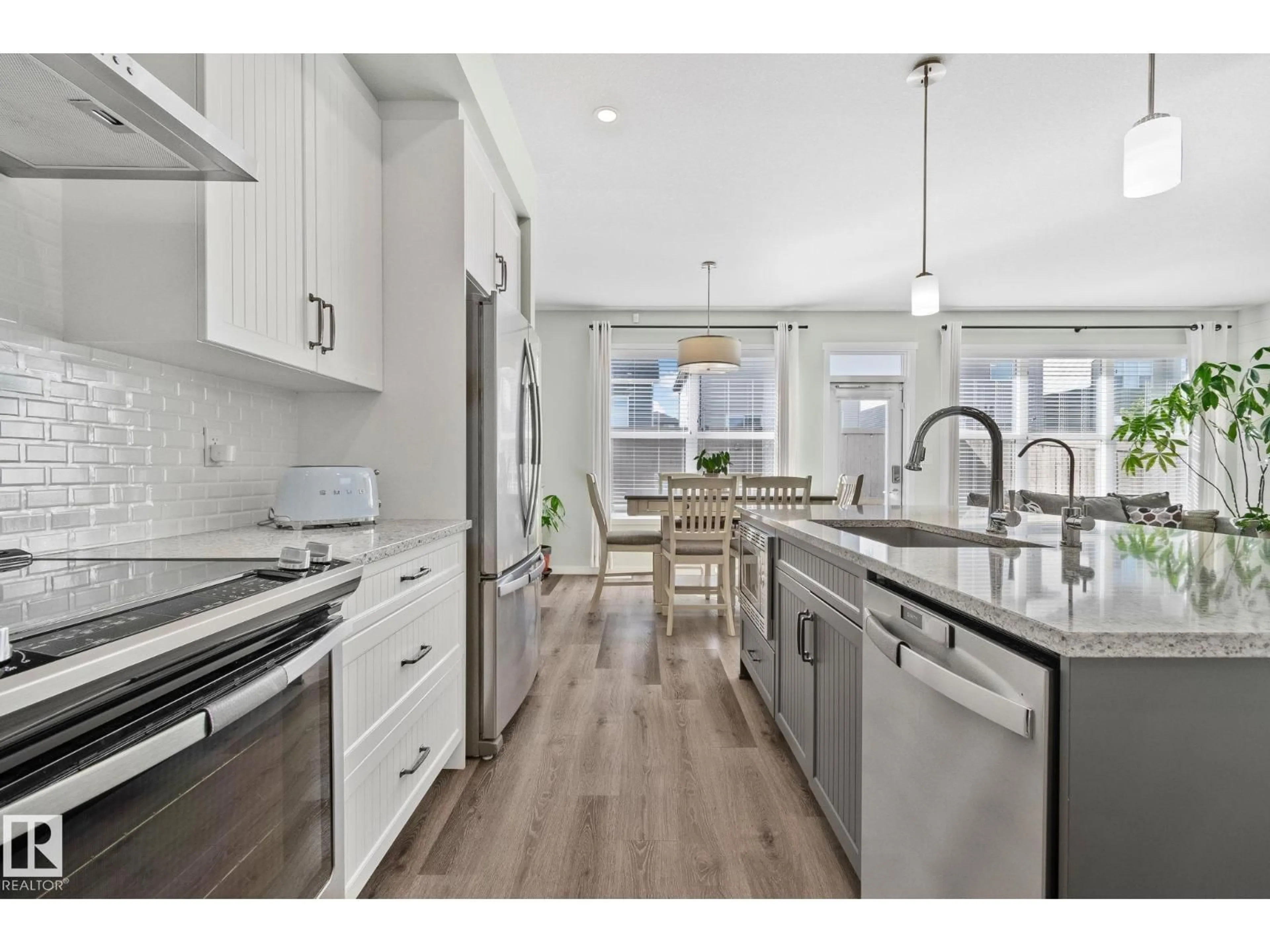 Open concept kitchen, ceramic/tile floor for PM NW - 1093 SECORD PROMENADE, Edmonton Alberta T5T1N1