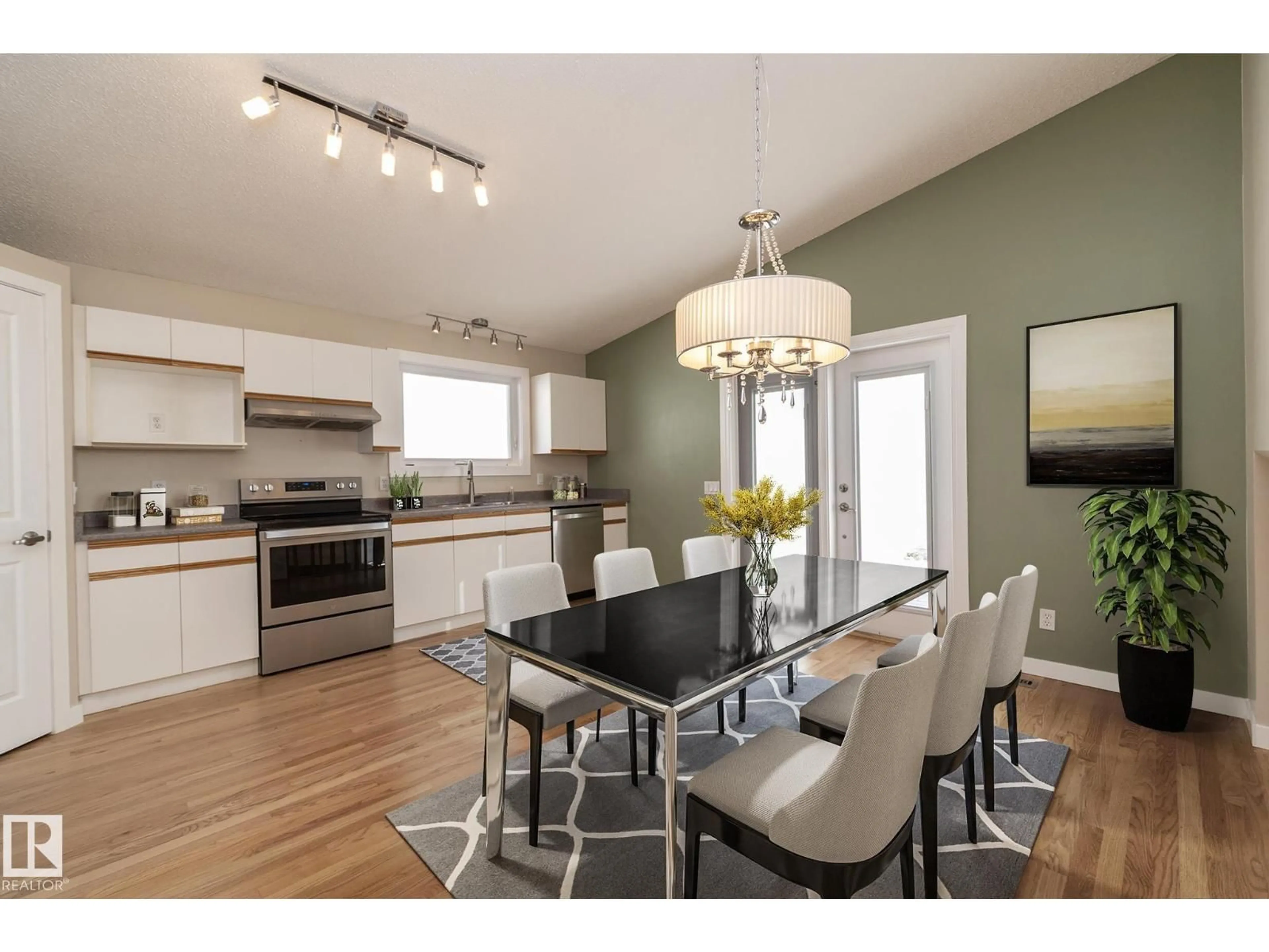Open concept kitchen, wood/laminate floor for 5111 191 ST, Edmonton Alberta T6M2R6