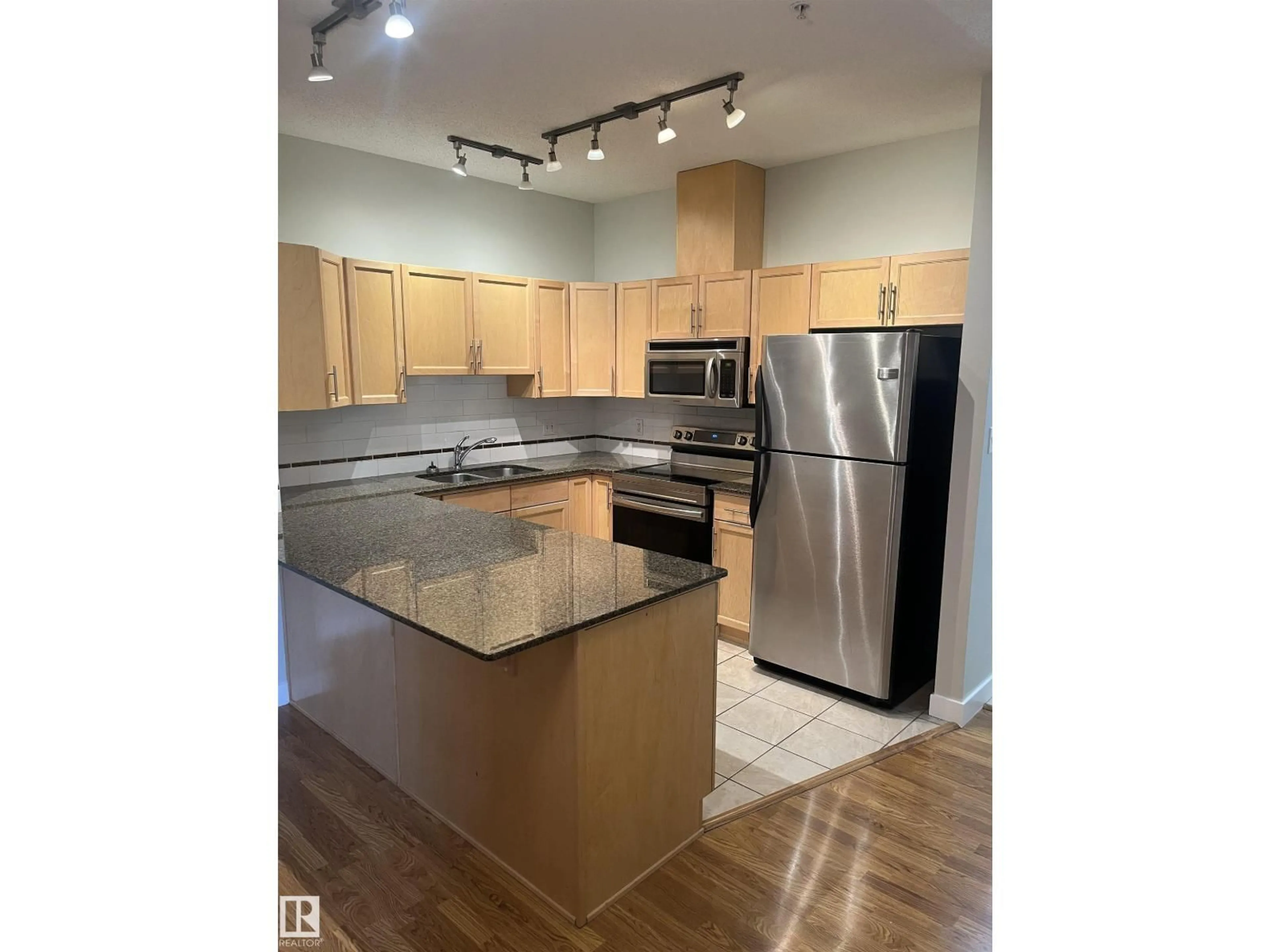 Open concept kitchen, unknown for 110 10333 112 ST NW, Edmonton Alberta T5K0B4