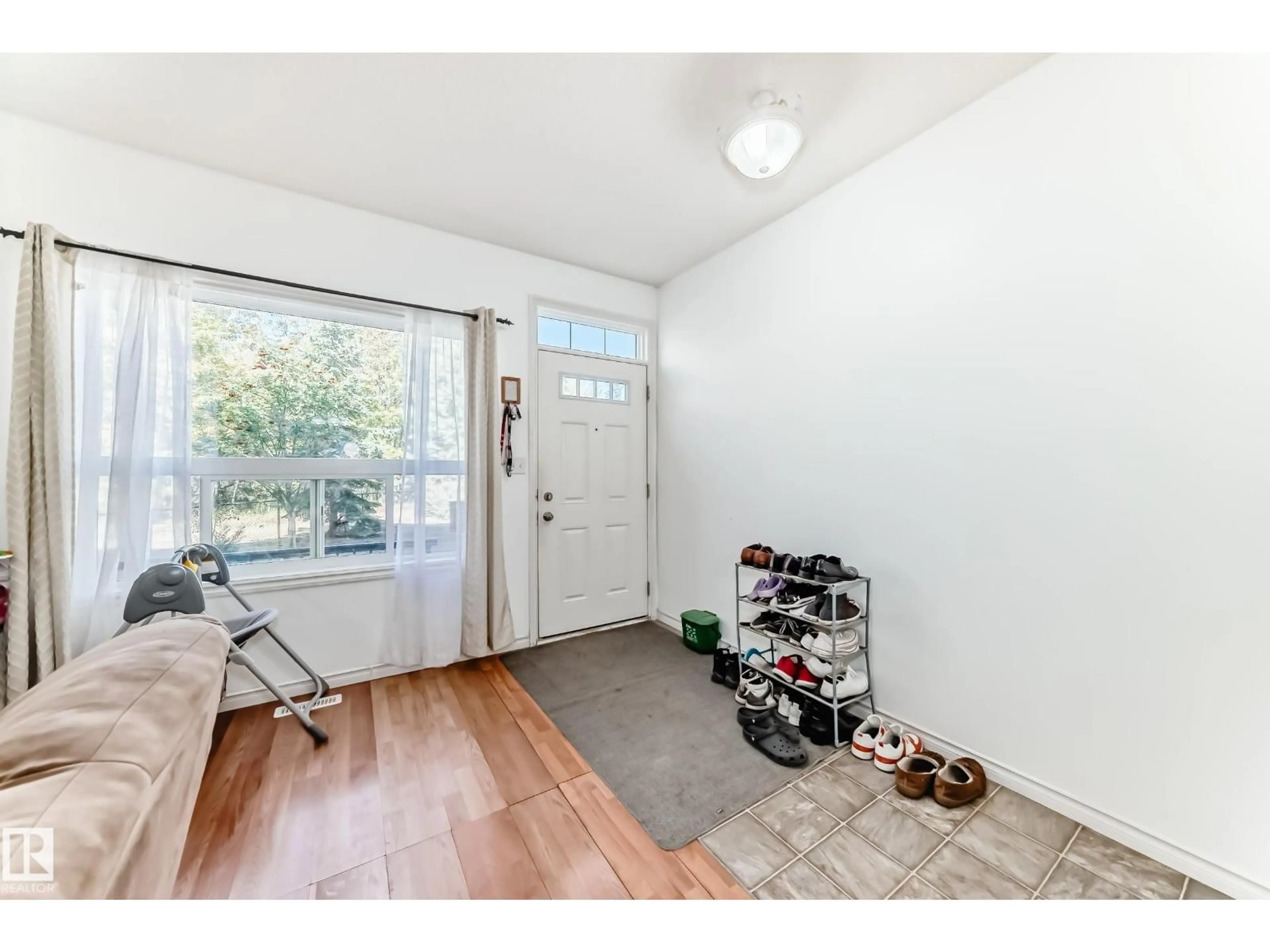 Indoor entryway for #115 - 3010 33 AV, Edmonton Alberta T6T0C3