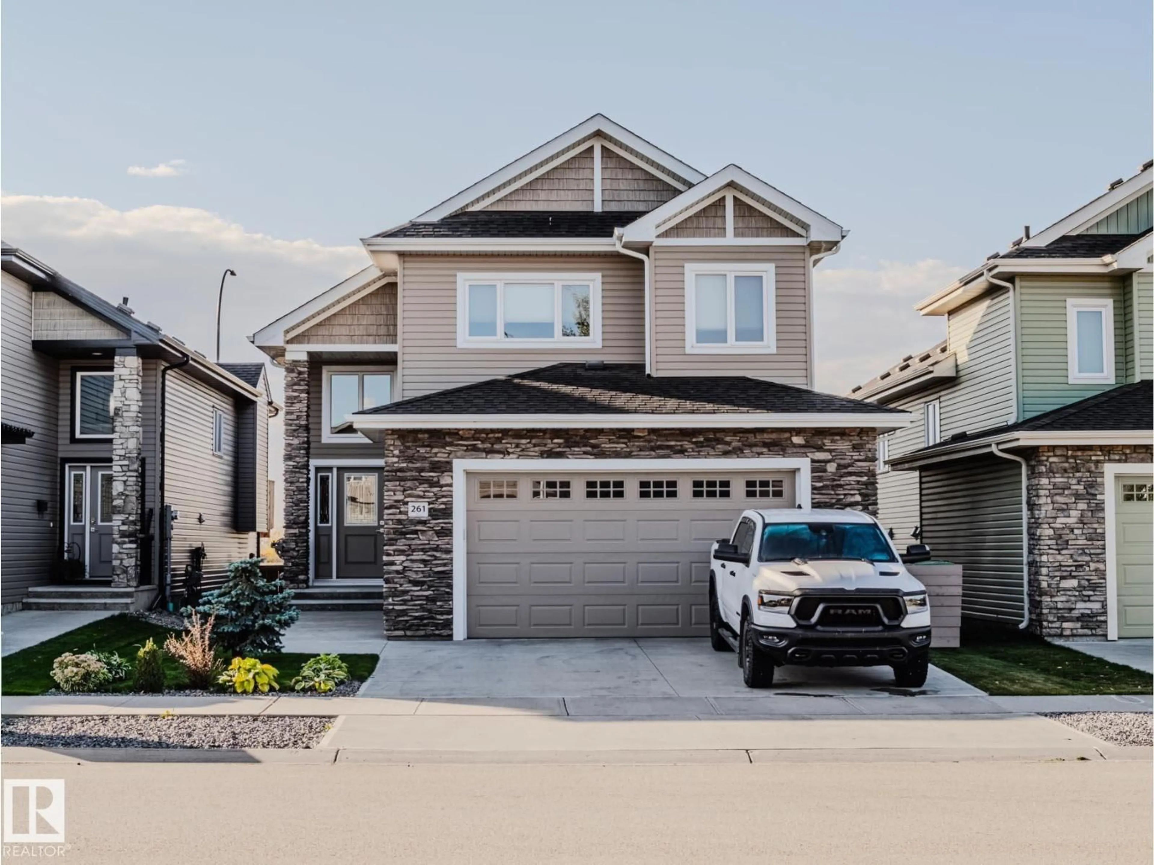 Home with vinyl exterior material, street for 261 WESTBROOK WD, Fort Saskatchewan Alberta T6L0L4